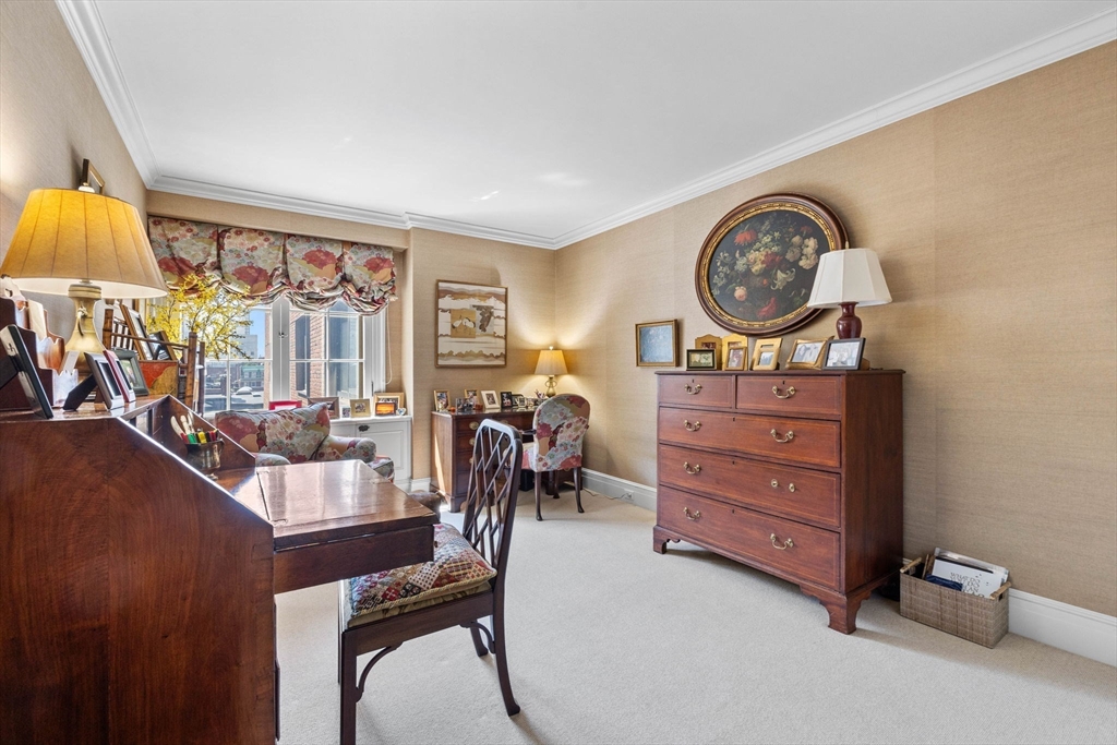 180 Beacon Street, Unit 9G Boston, MA 02116 - Photo 7 of 23 a living room with furniture and a closet
