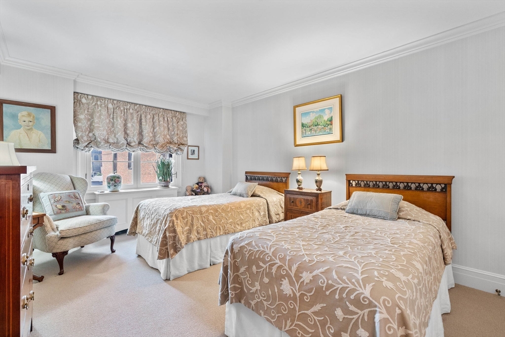180 Beacon Street, Unit 9G Boston, MA 02116 - Photo 9 of 23 a bedroom with two beds and a window
