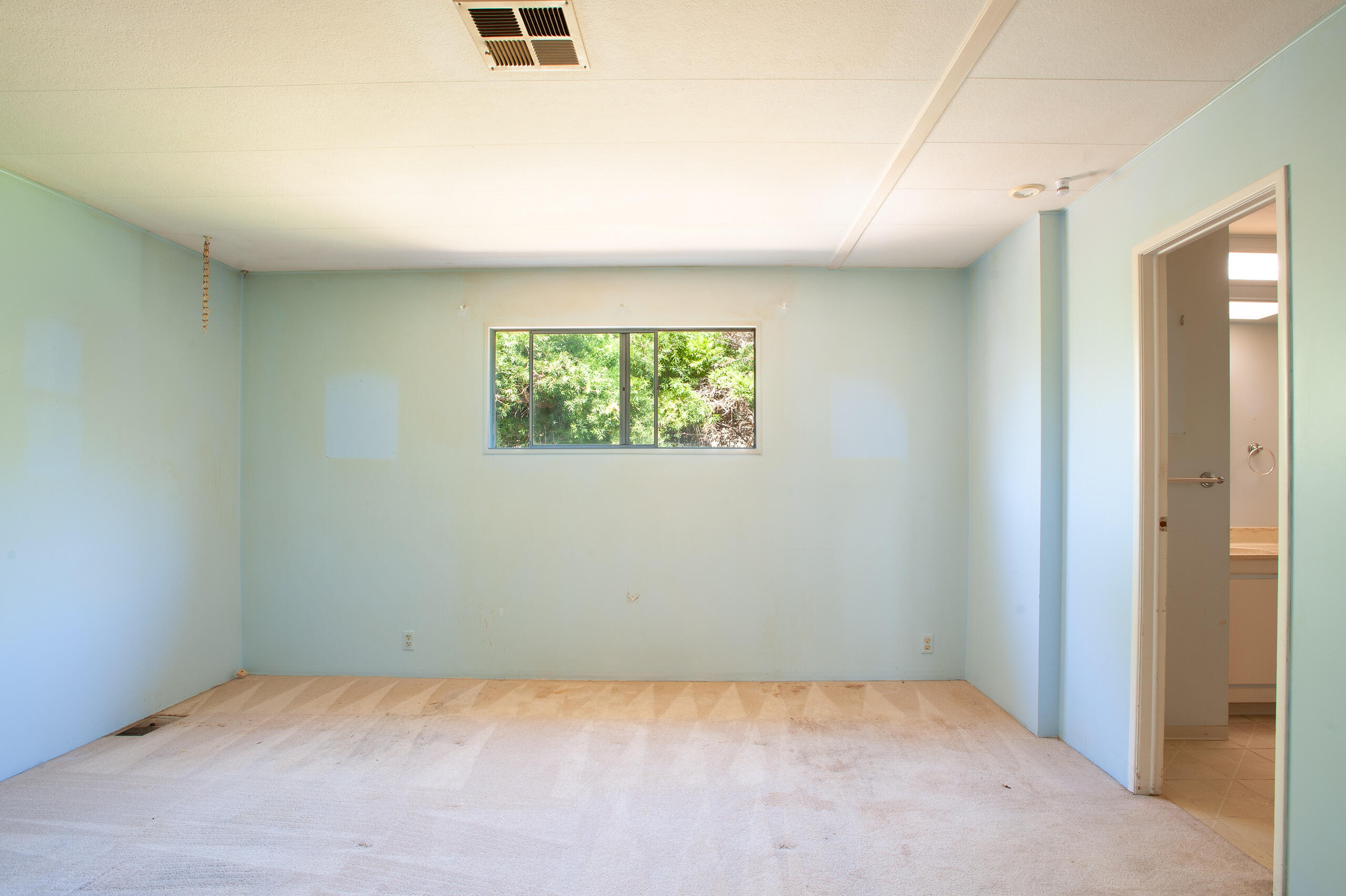 6180 Via Real, Unit 29 Carpinteria, CA 93013 - Photo 12 of 19 an empty room with windows