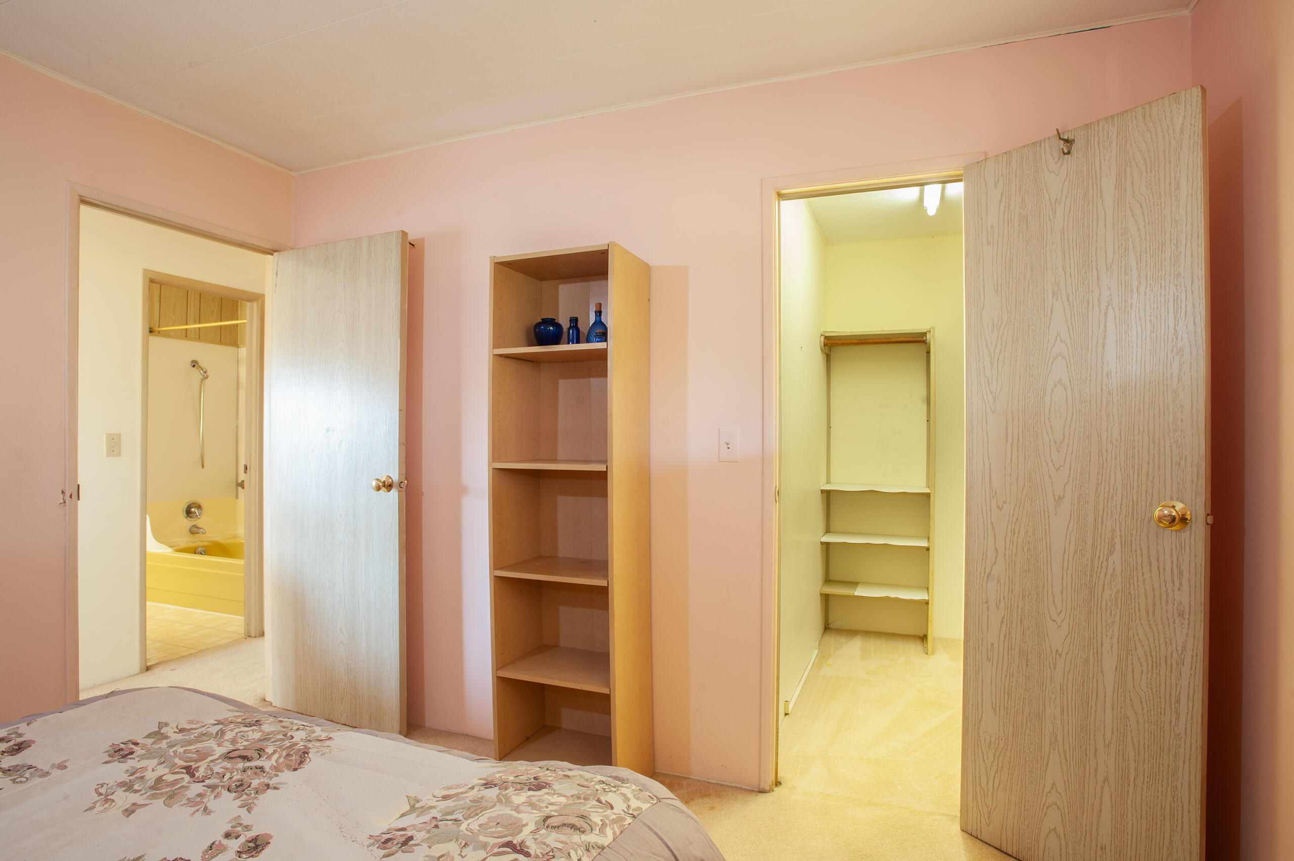 6180 Via Real, Unit 29 Carpinteria, CA 93013 - Photo 14 of 19 a bedroom with a bed and a bathroom