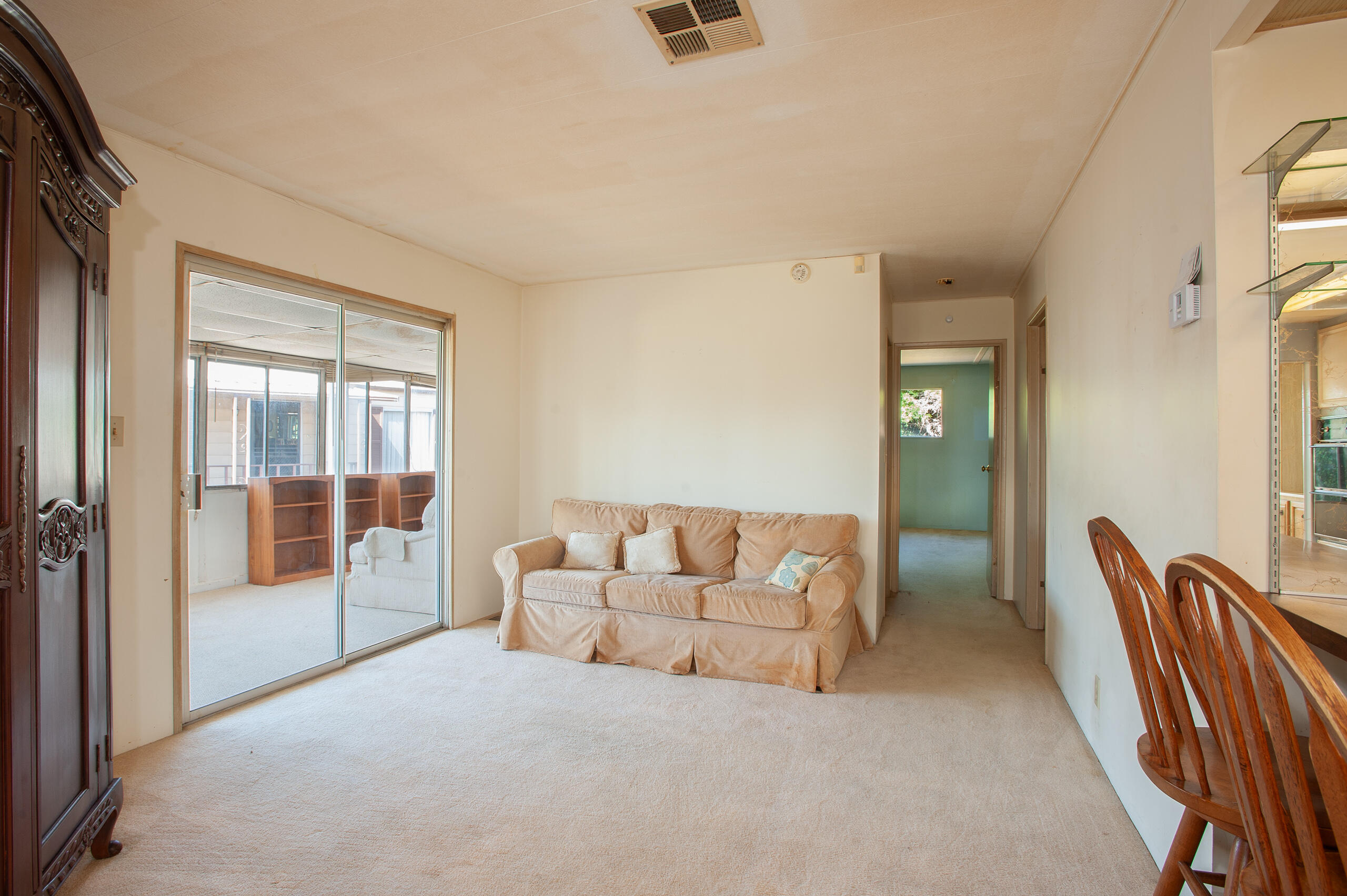6180 Via Real, Unit 29 Carpinteria, CA 93013 - Photo 6 of 19 a living room with furniture and a window