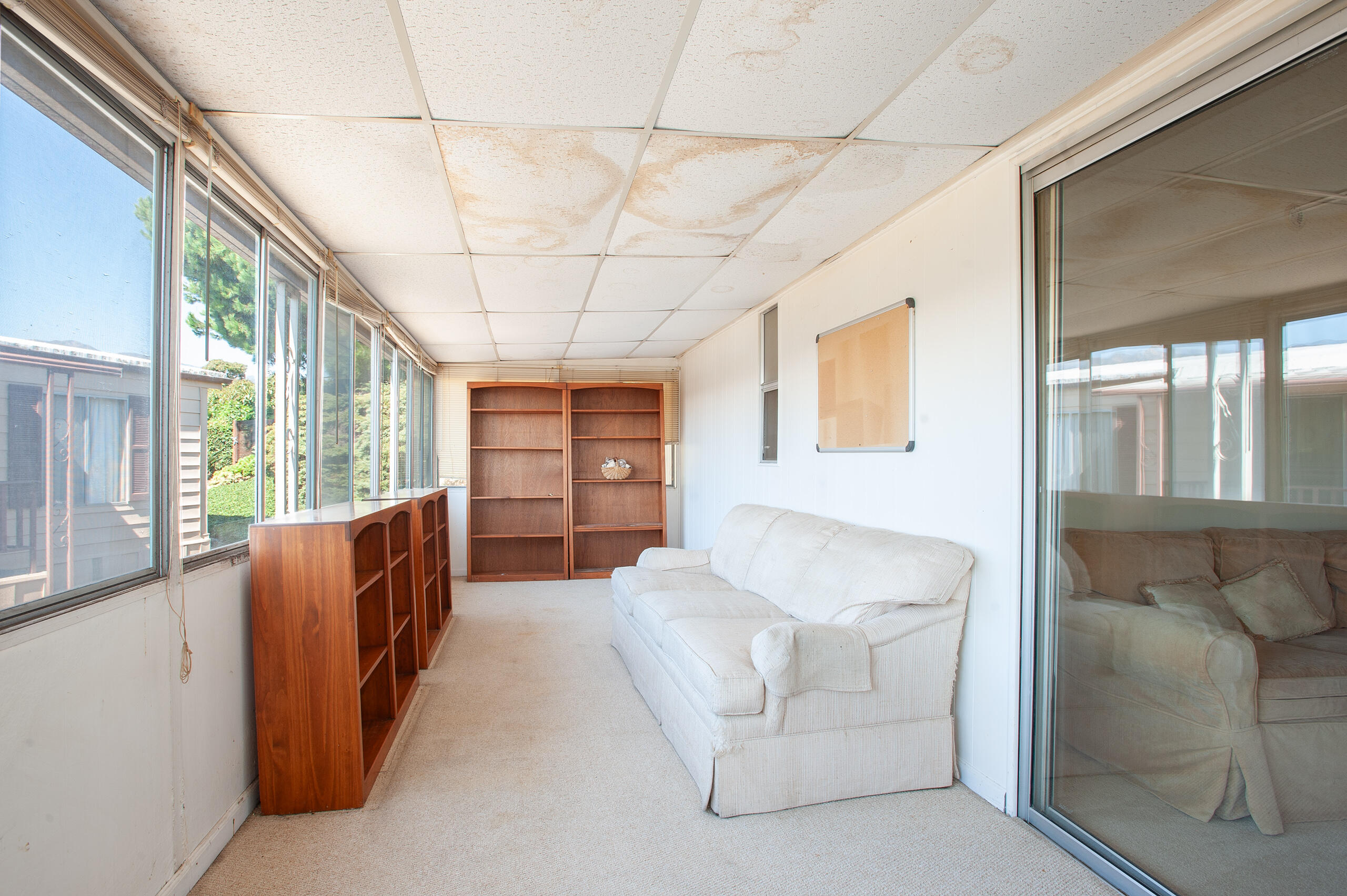6180 Via Real, Unit 29 Carpinteria, CA 93013 - Photo 10 of 19 a living room with furniture and a large window