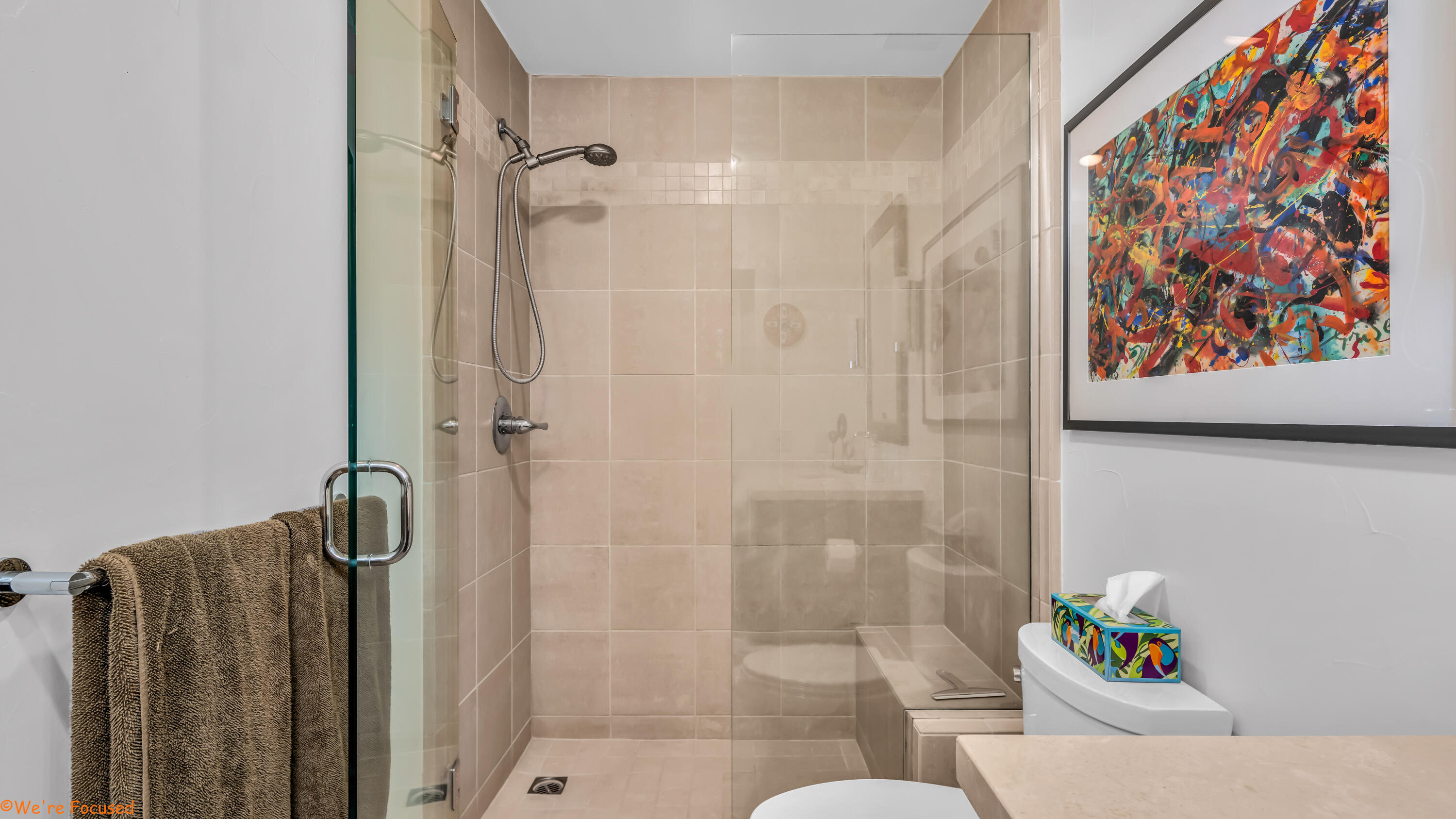 1655 East Palm Canyon Drive, Unit 202 Palm Springs, CA 92264 - Photo 13 of 26 a bathroom with a shower and a toilet