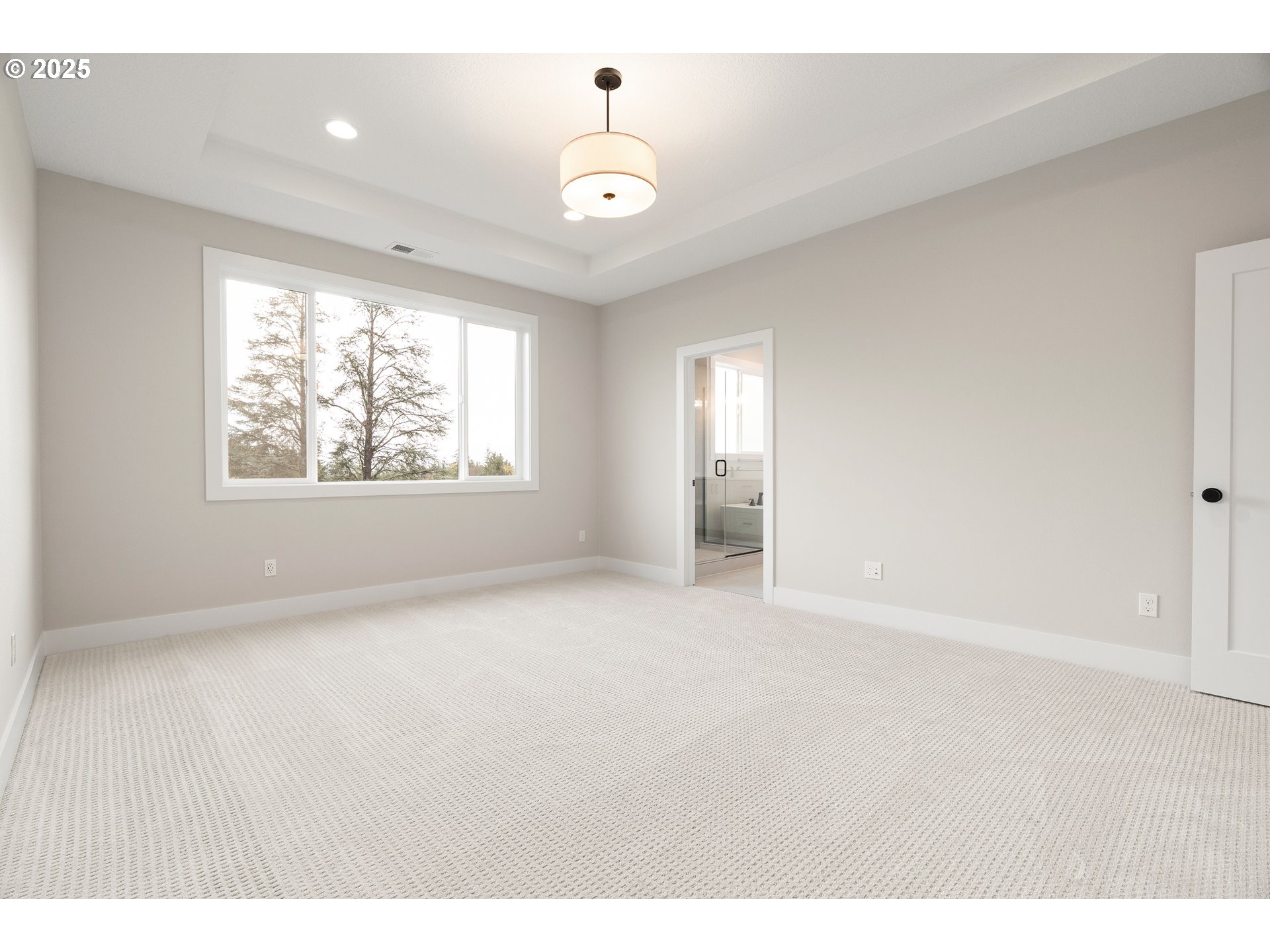 11486 Northwest Elise Lane Portland, OR 97229 - Photo 28 of 48 a view of an empty room with a window