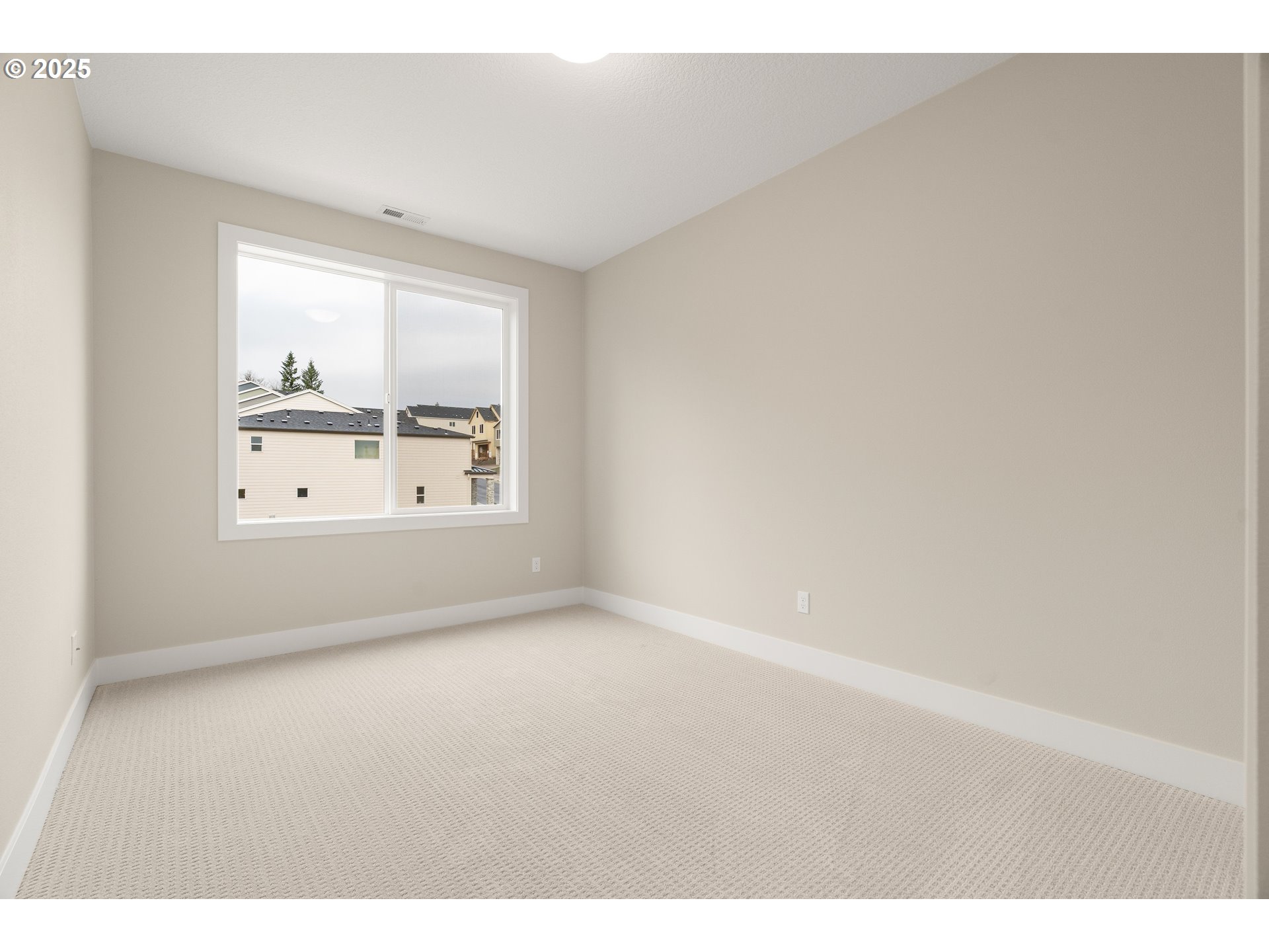 11486 Northwest Elise Lane Portland, OR 97229 - Photo 35 of 48 a view of an empty room with a window