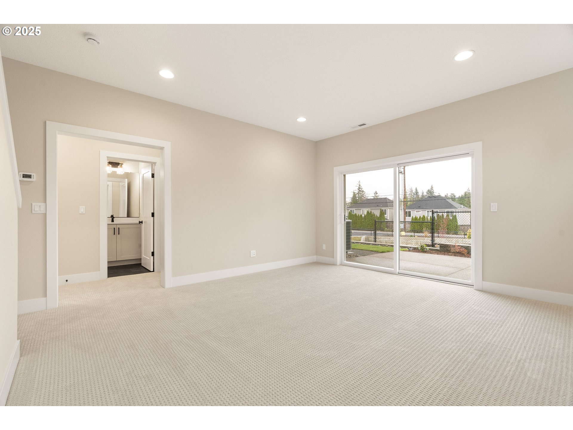 11486 Northwest Elise Lane Portland, OR 97229 - Photo 42 of 48 a view of an empty room with a window