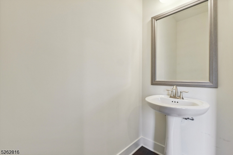 12 Gerhard Place Morristown, NJ 07960 - Photo 4 of 14 a bathroom with a sink and a mirror
