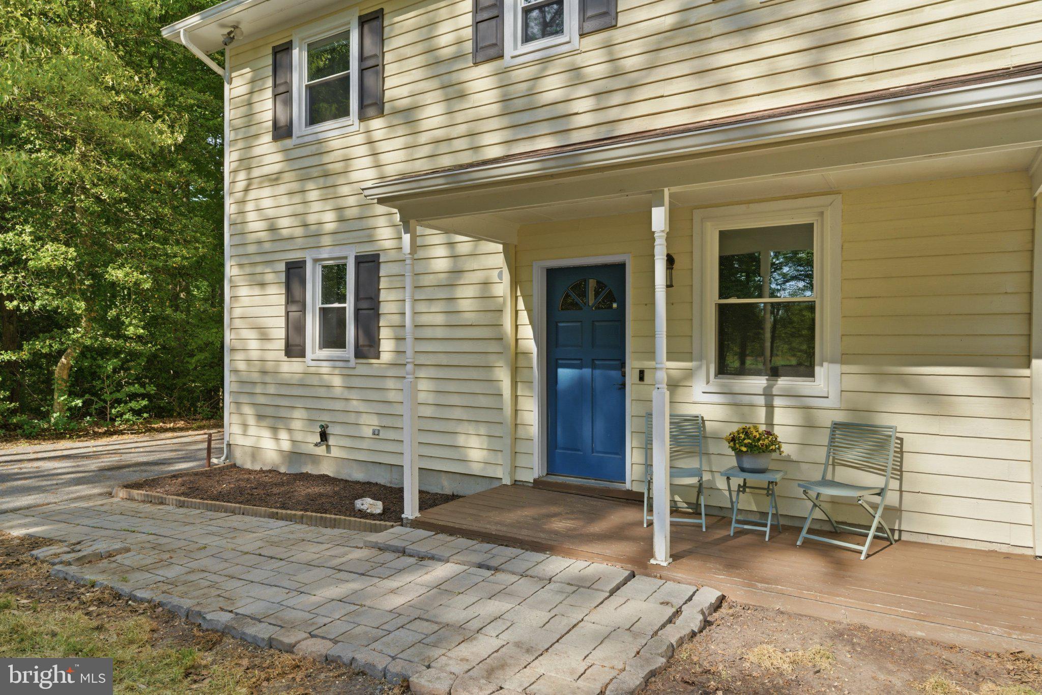 10560 South Faulkner Road Faulkner, MD 20632 - Photo 11 of 60 Charming entryway with blue door.