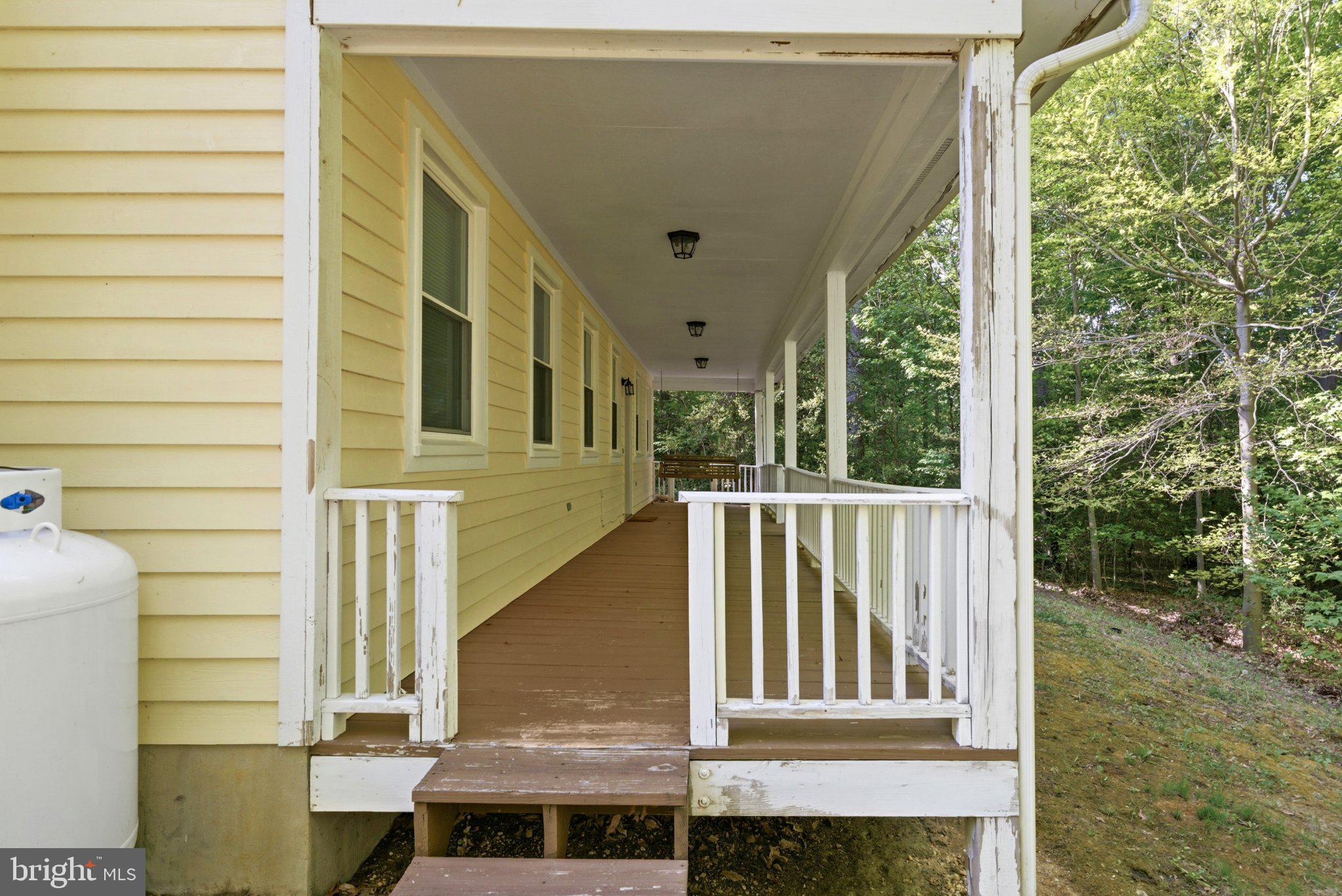 10560 South Faulkner Road Faulkner, MD 20632 - Photo 15 of 60 Charming porch with serene views.