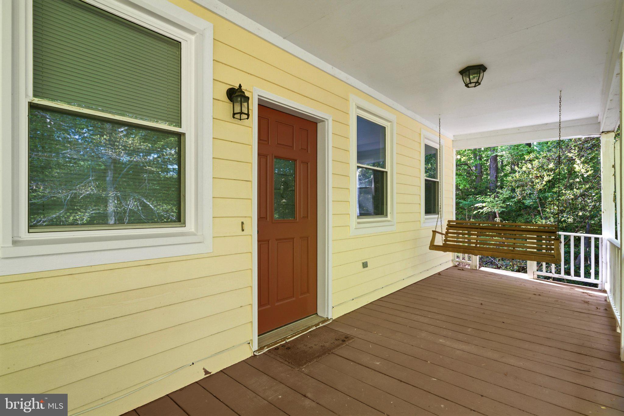 10560 South Faulkner Road Faulkner, MD 20632 - Photo 17 of 60 Charming porch with serene views.