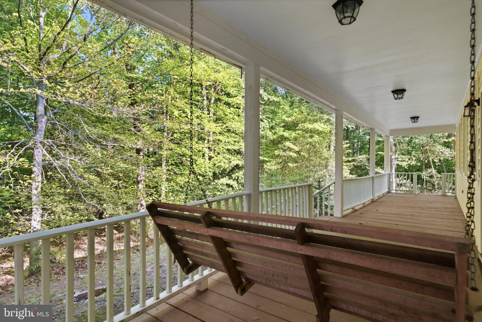 10560 South Faulkner Road Faulkner, MD 20632 - Photo 18 of 60 Serene porch with forest views.