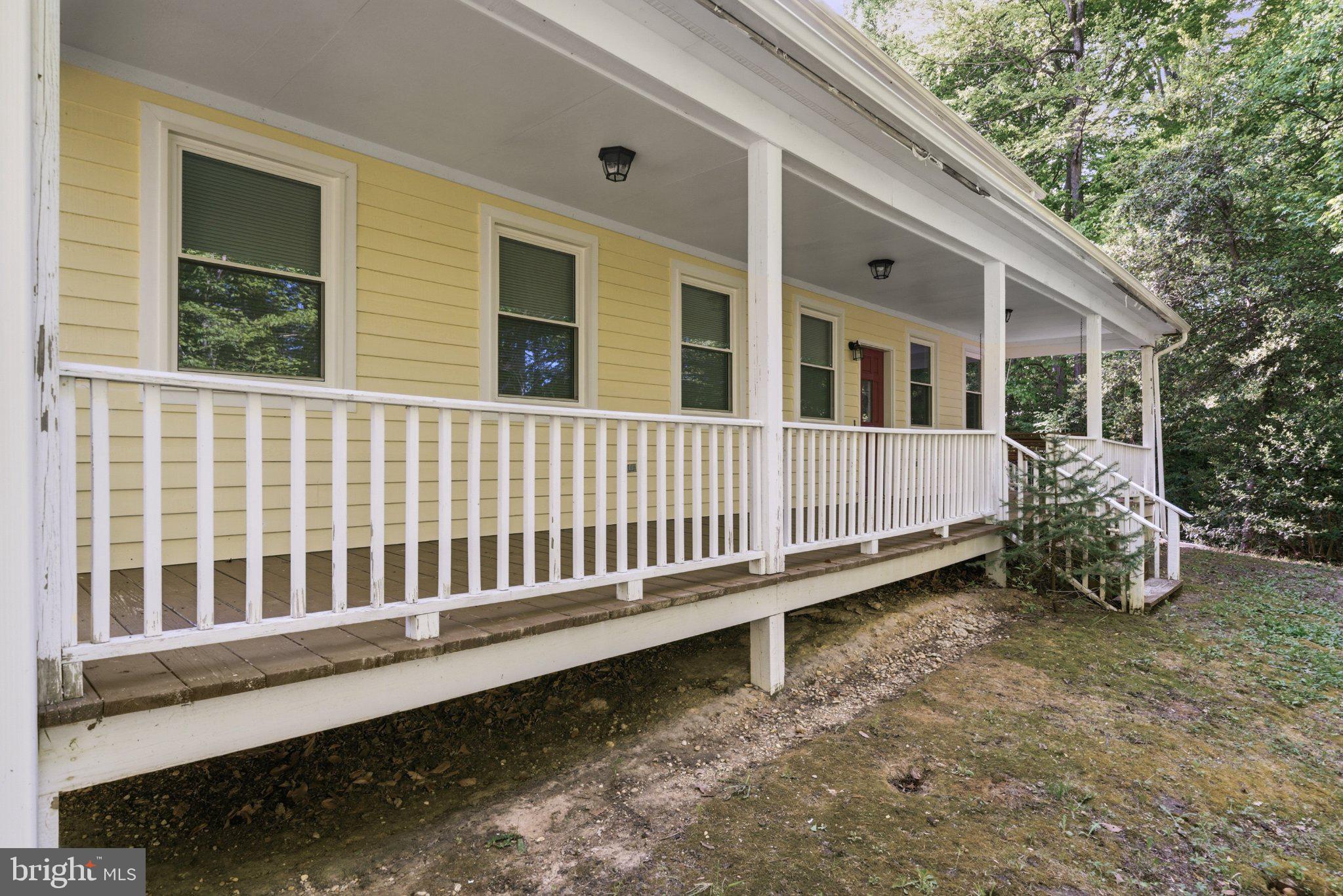 10560 South Faulkner Road Faulkner, MD 20632 - Photo 19 of 60 Charming yellow home with inviting porch.