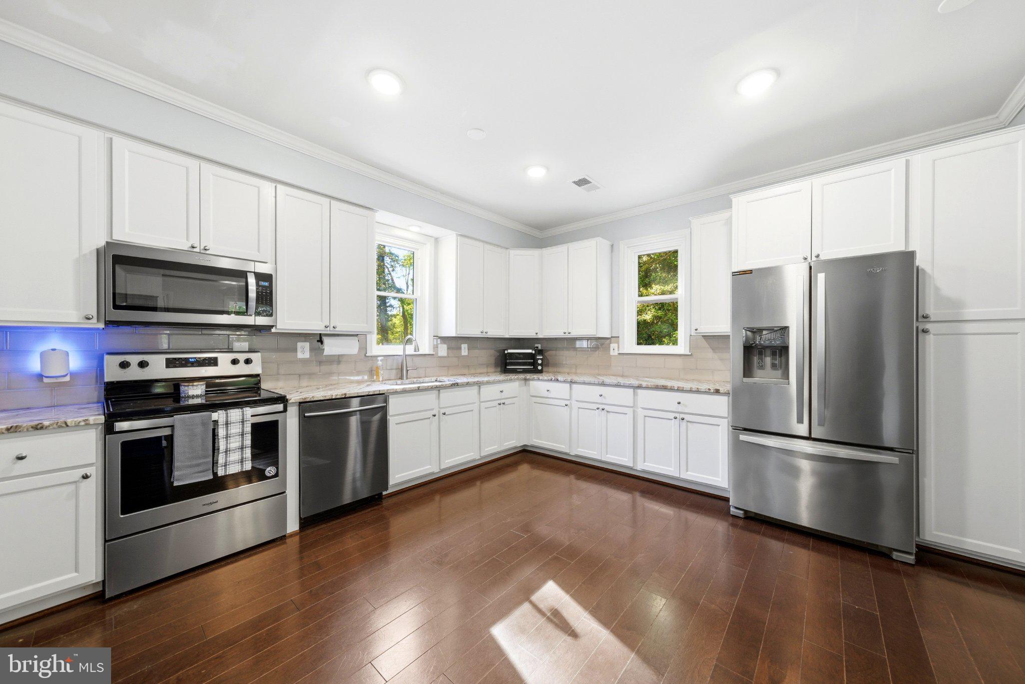 10560 South Faulkner Road Faulkner, MD 20632 - Photo 2 of 60 Modern kitchen with sleek finishes.