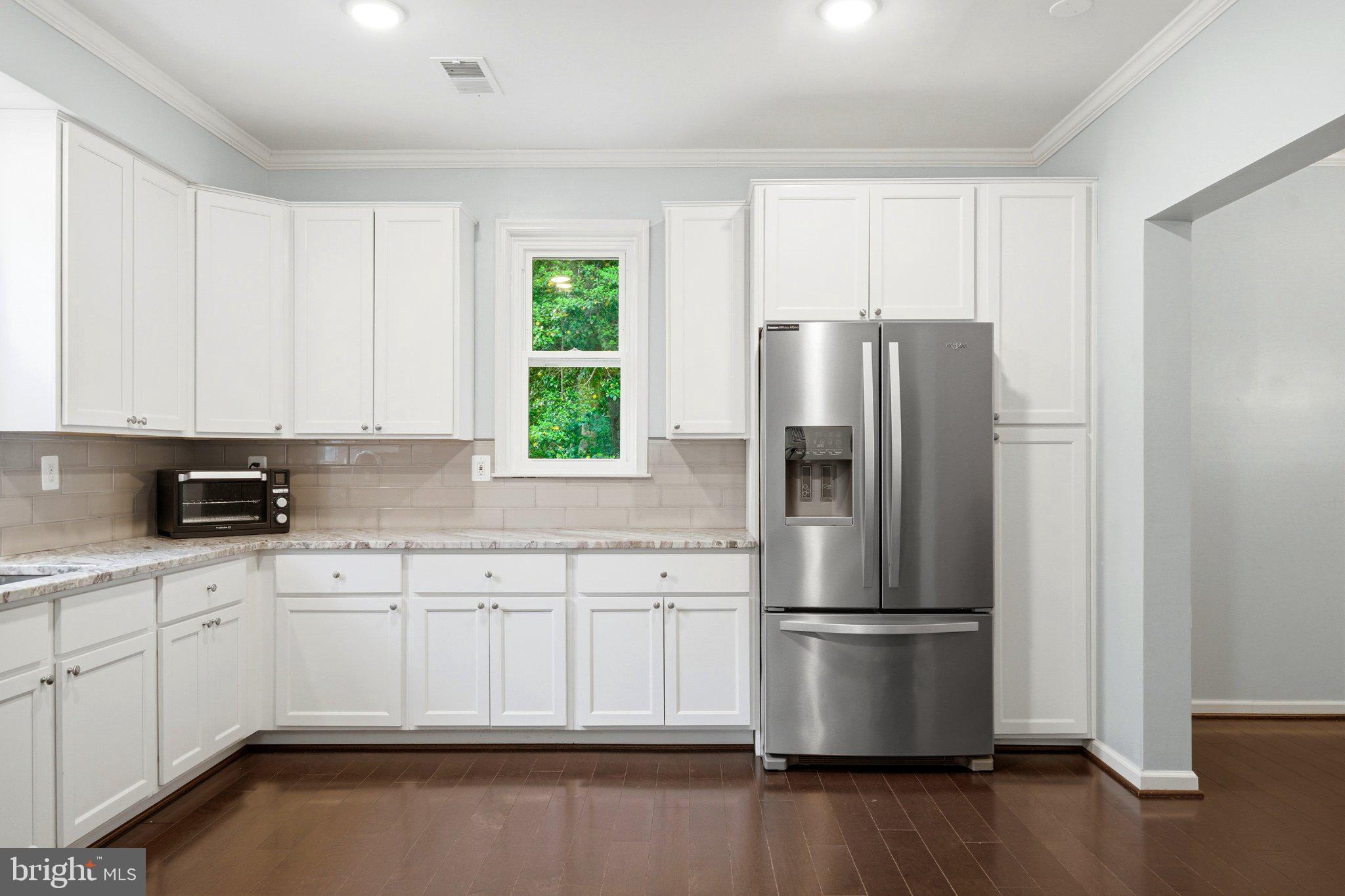 10560 South Faulkner Road Faulkner, MD 20632 - Photo 26 of 60 Bright and airy modern kitchen space.