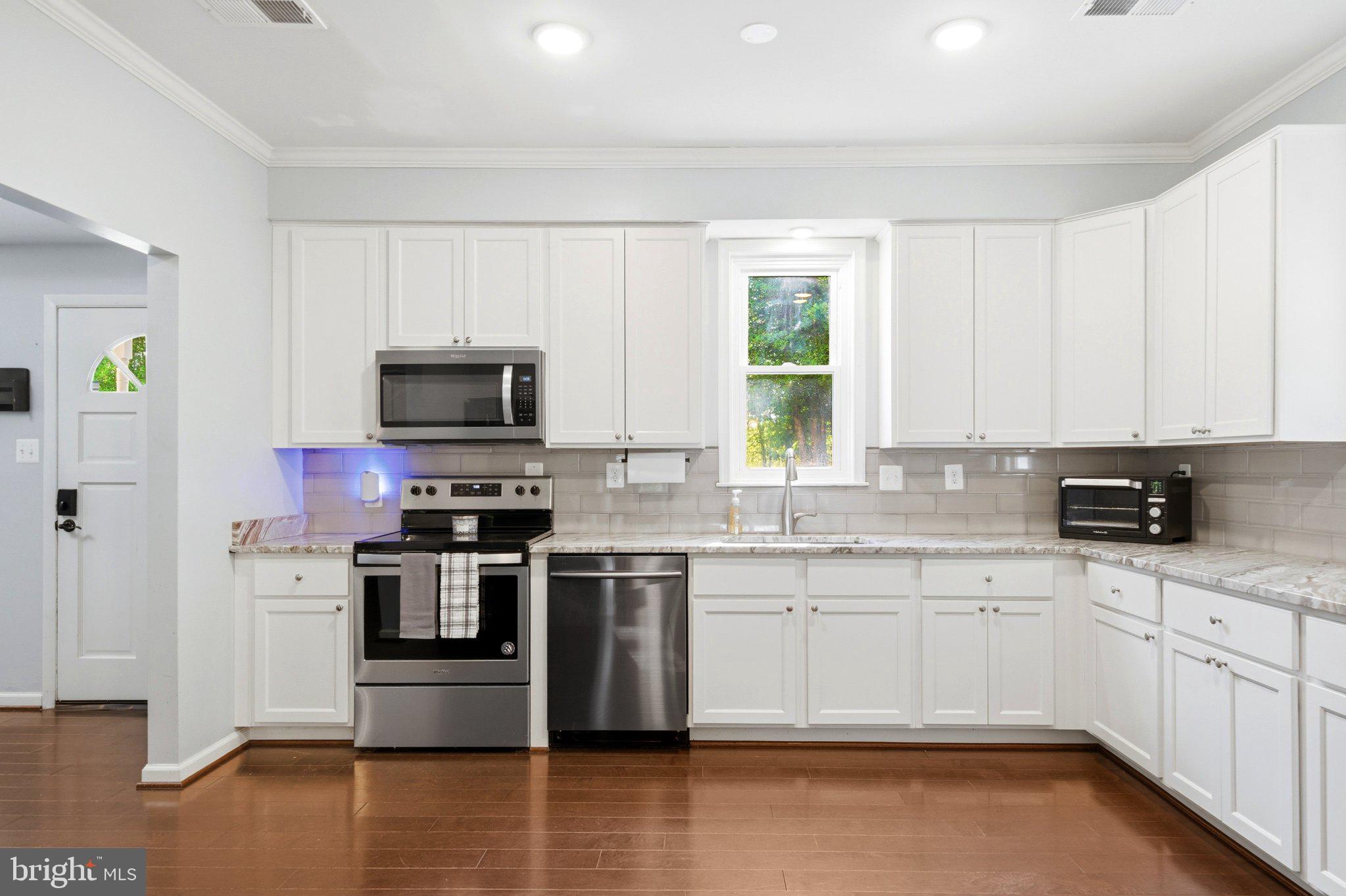 10560 South Faulkner Road Faulkner, MD 20632 - Photo 29 of 60 Modern kitchen with sleek finishes.