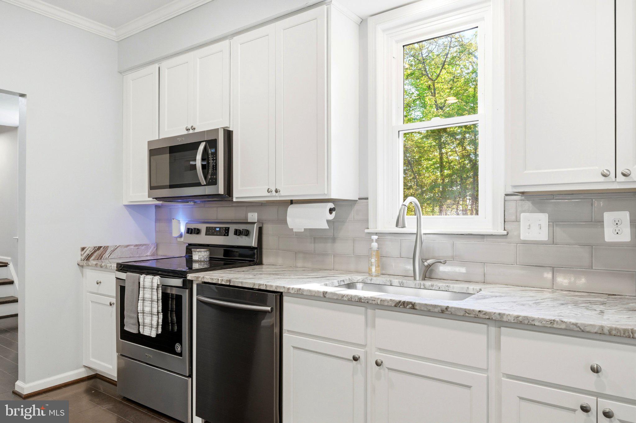 10560 South Faulkner Road Faulkner, MD 20632 - Photo 31 of 60 Modern kitchen with natural light.