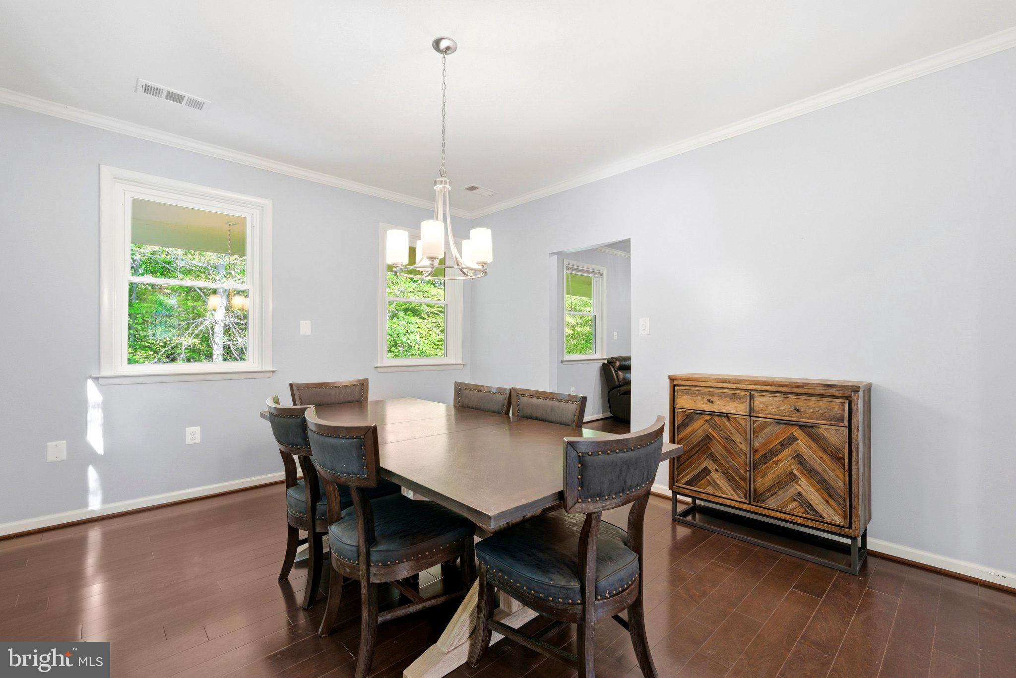 10560 South Faulkner Road Faulkner, MD 20632 - Photo 33 of 60 Bright dining space with nature views.