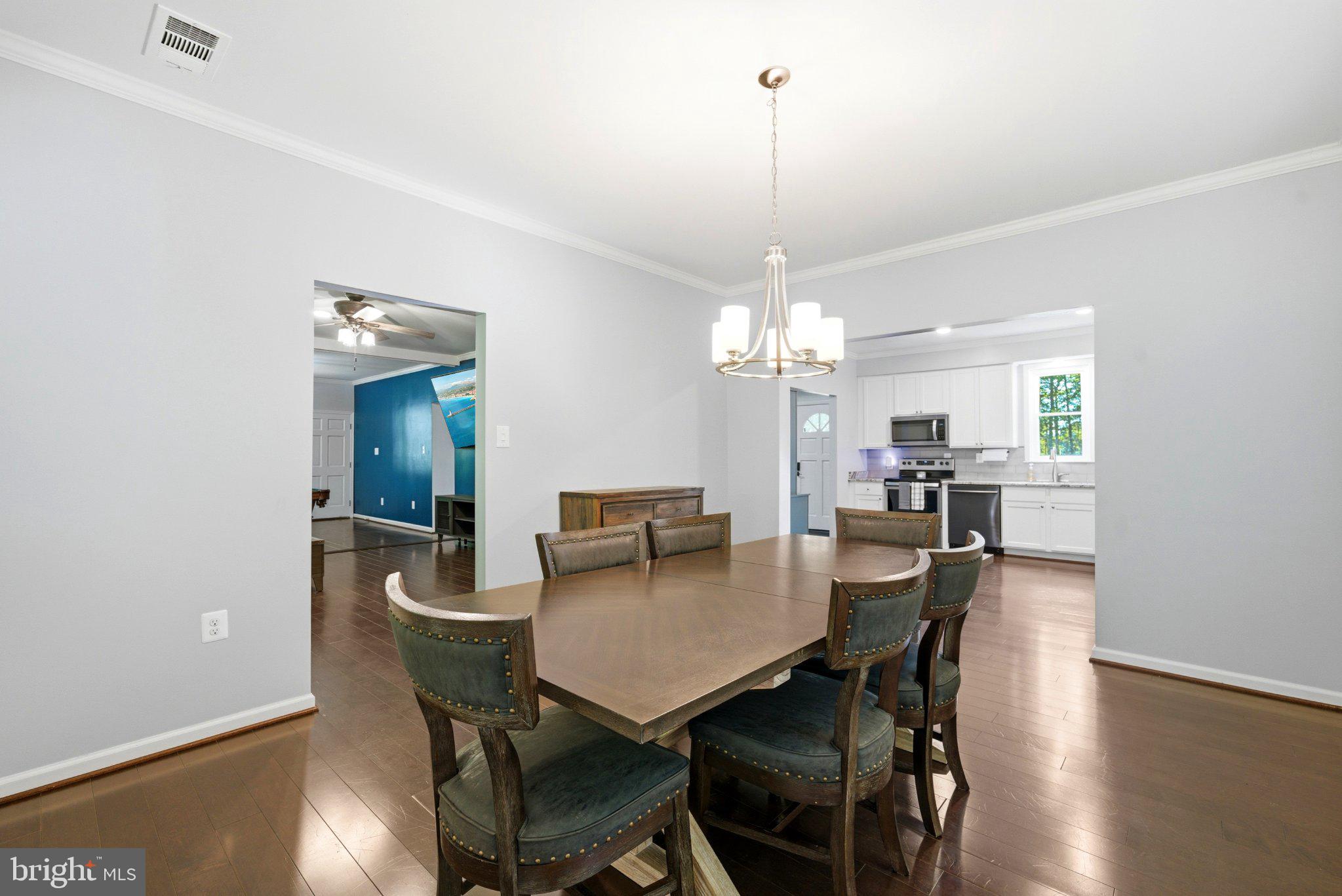 10560 South Faulkner Road Faulkner, MD 20632 - Photo 34 of 60 Bright dining space with modern charm.