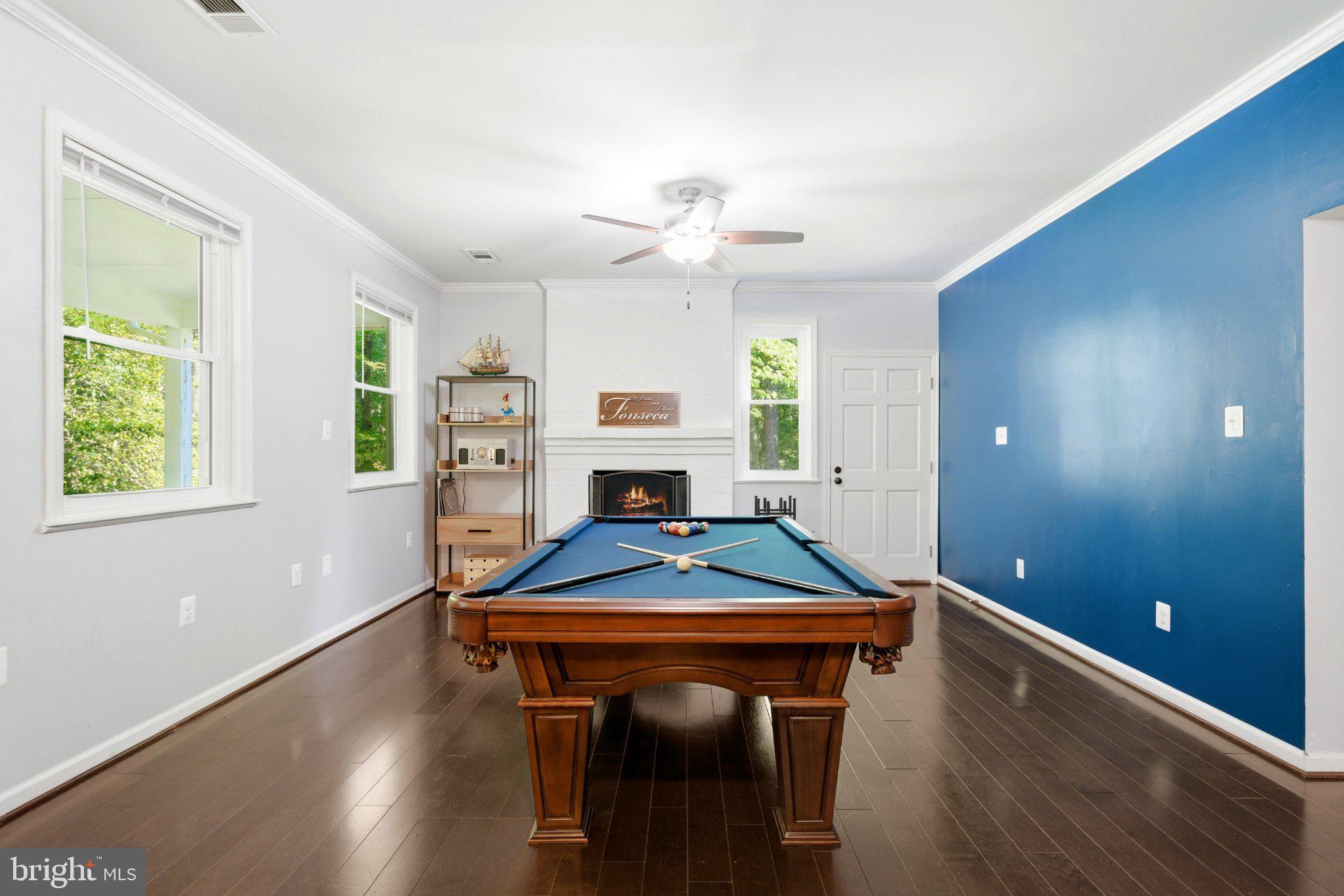 10560 South Faulkner Road Faulkner, MD 20632 - Photo 37 of 60 Spacious game room with vibrant accents.