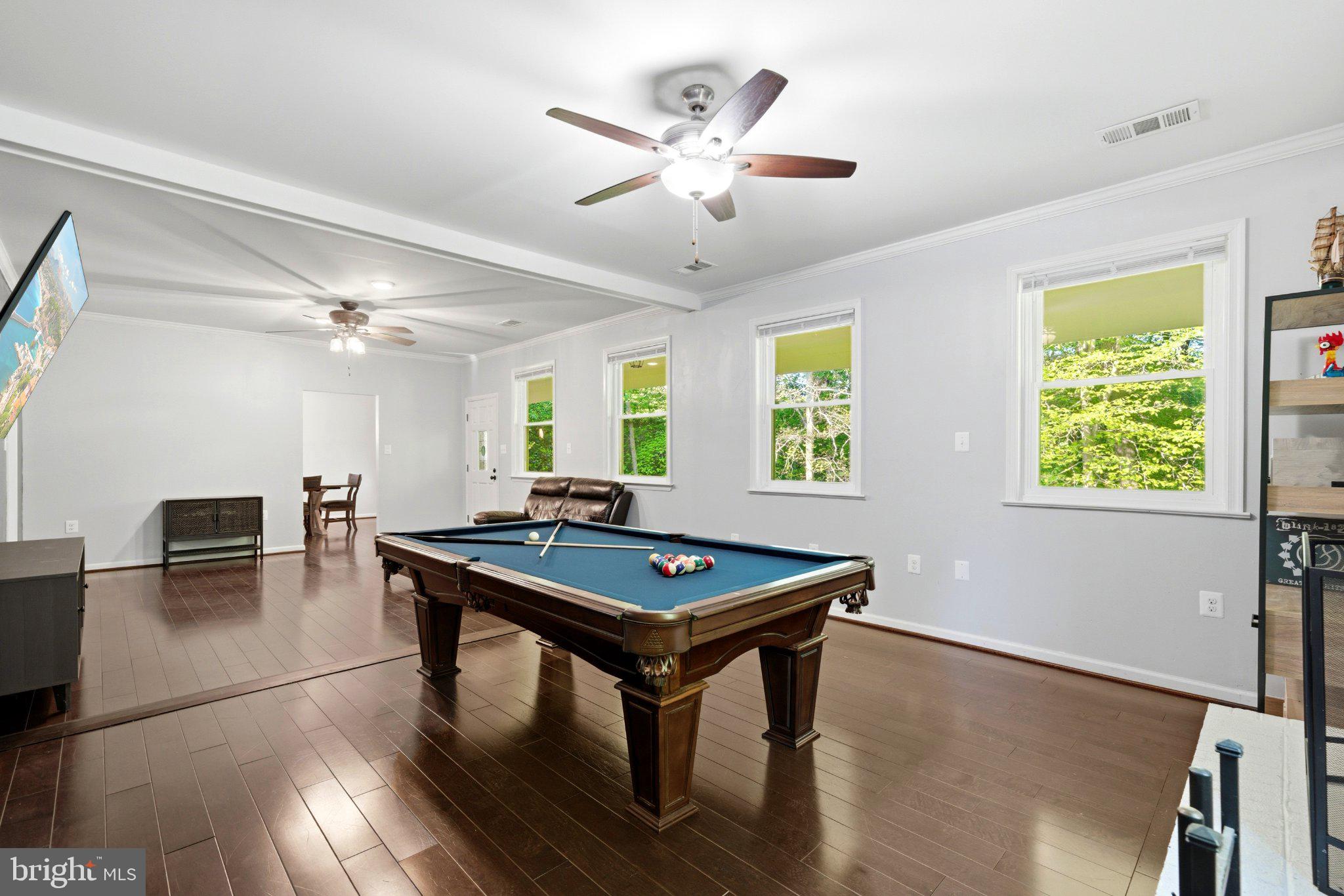 10560 South Faulkner Road Faulkner, MD 20632 - Photo 39 of 60 Bright game room with pool table charm.