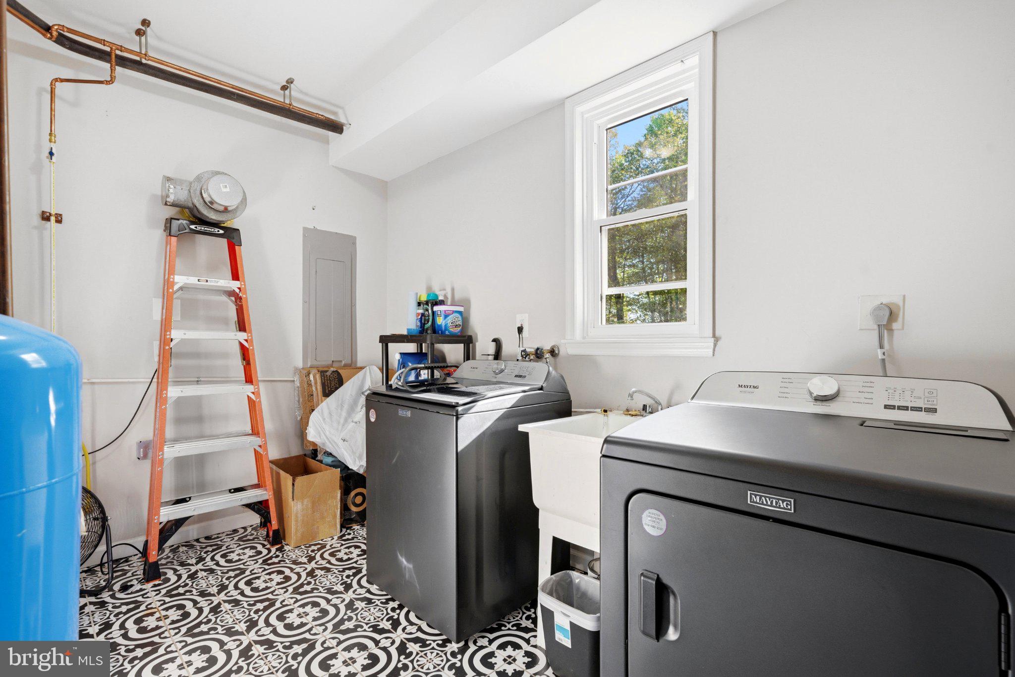 10560 South Faulkner Road Faulkner, MD 20632 - Photo 43 of 60 Bright and functional laundry space.