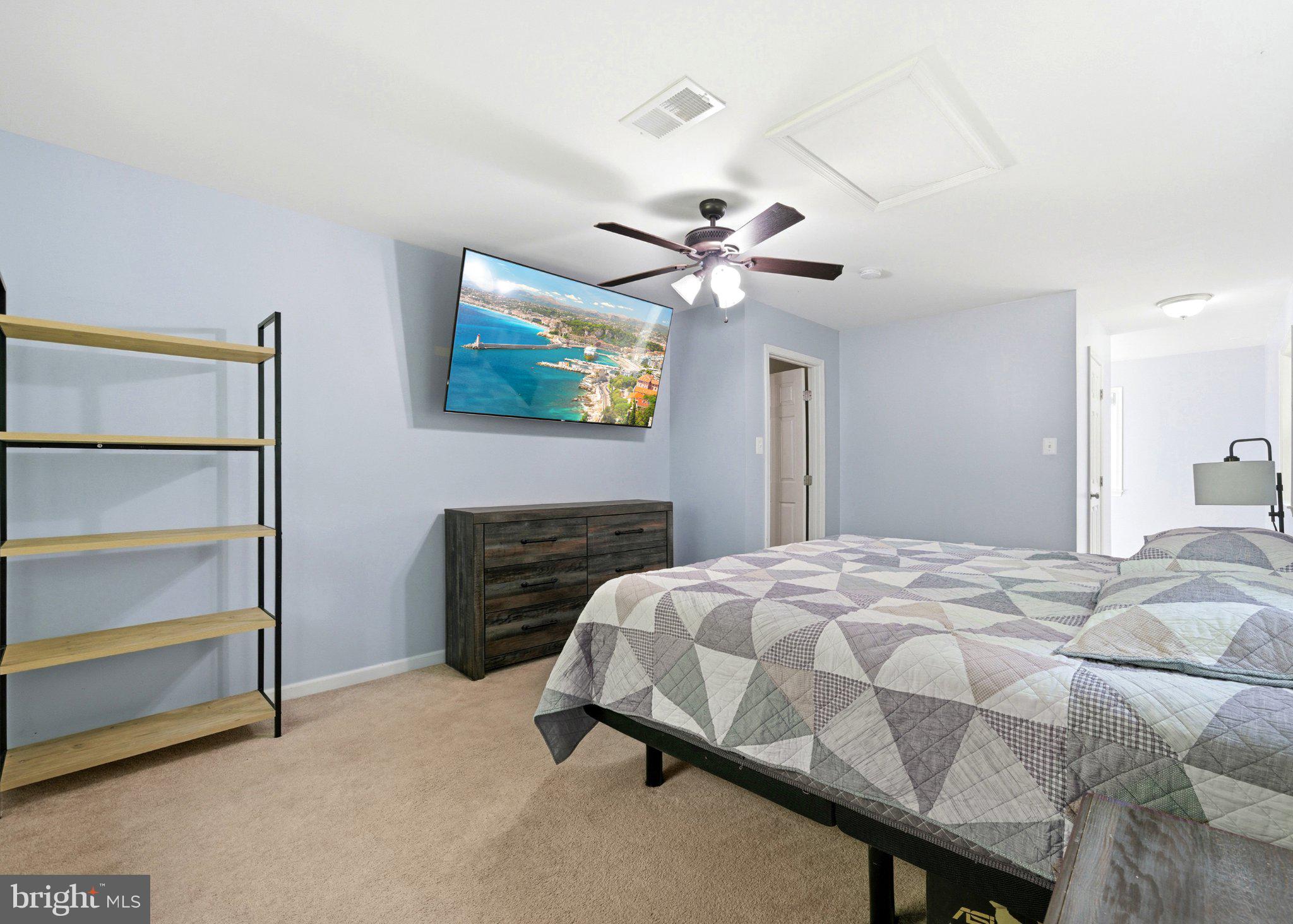 10560 South Faulkner Road Faulkner, MD 20632 - Photo 49 of 60 Serene bedroom with modern amenities.