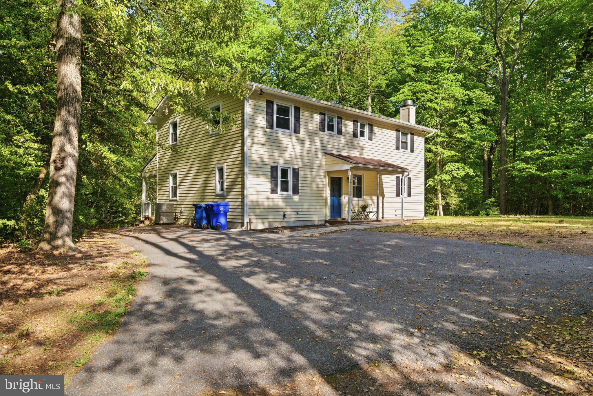 10560 South Faulkner Road Faulkner, MD 20632 - Photo 5 of 60 Charming home nestled in lush greenery.