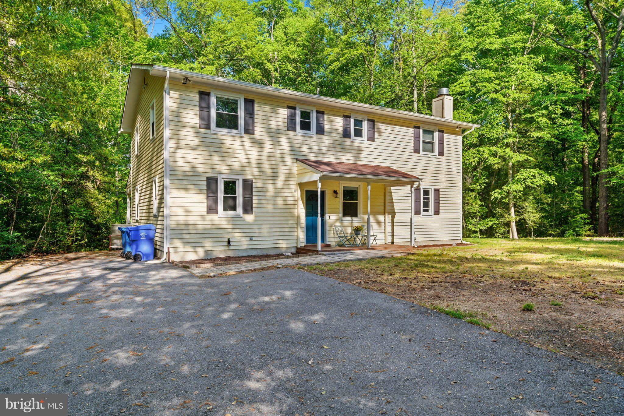 10560 South Faulkner Road Faulkner, MD 20632 - Photo 6 of 60 Charming home nestled in lush greenery.