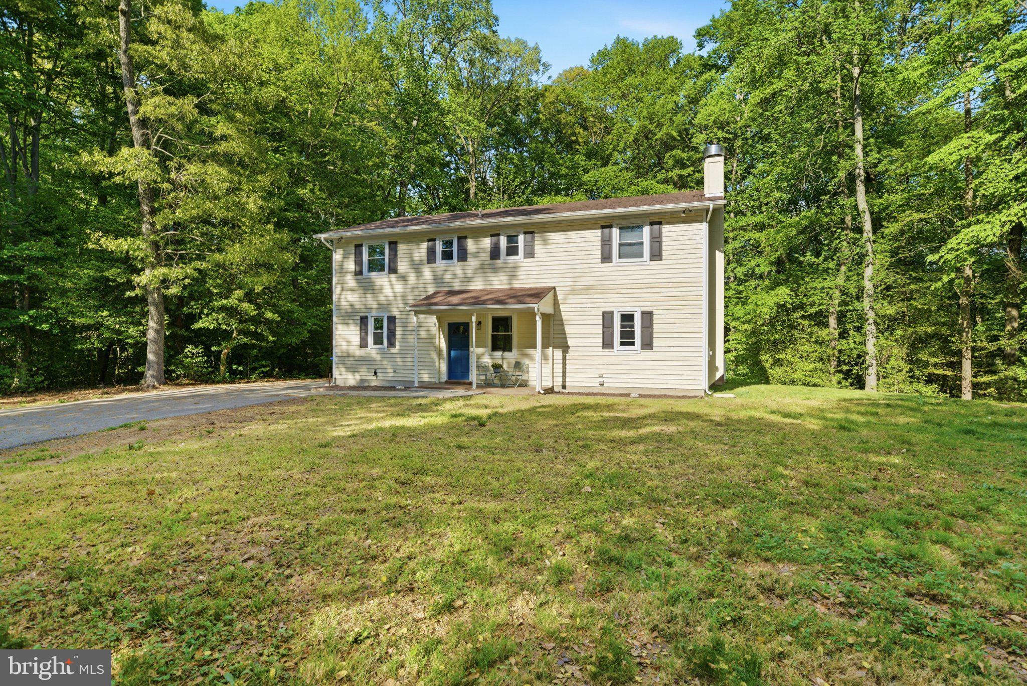 10560 South Faulkner Road Faulkner, MD 20632 - Photo 9 of 60 Charming home nestled in lush greenery.
