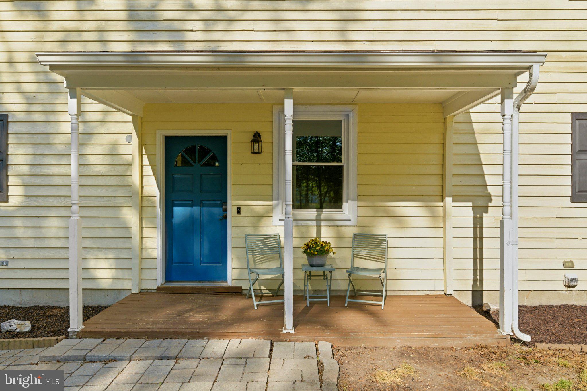 10560 South Faulkner Road Faulkner, MD 20632 - Photo 10 of 60 Charming entryway with vibrant blue door.