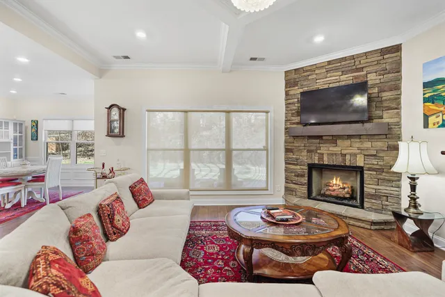 a kitchen with stainless steel appliances granite countertop a refrigerator a stove a sink and dishwasher