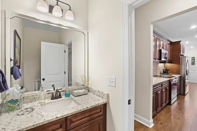 a view of an empty room with window and cabinet