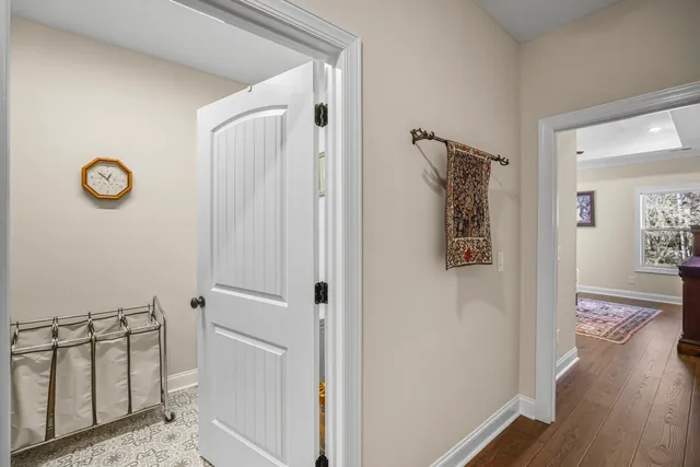 a view of a big room with closet and windows