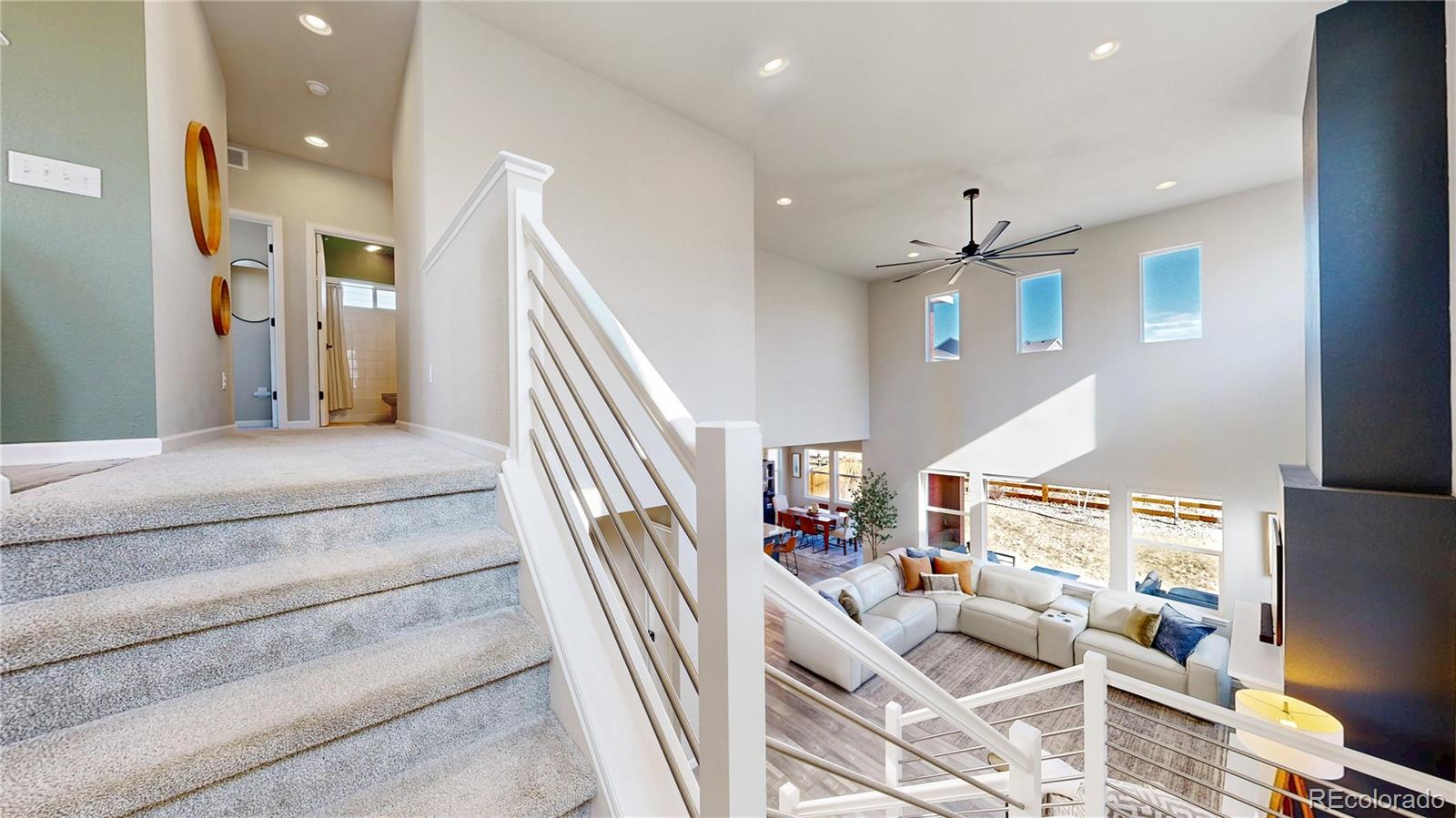 1107 Basalt Ridge Loop Castle Rock, CO 80108 - Photo 20 of 50 a view of entryway and hall with wooden floor