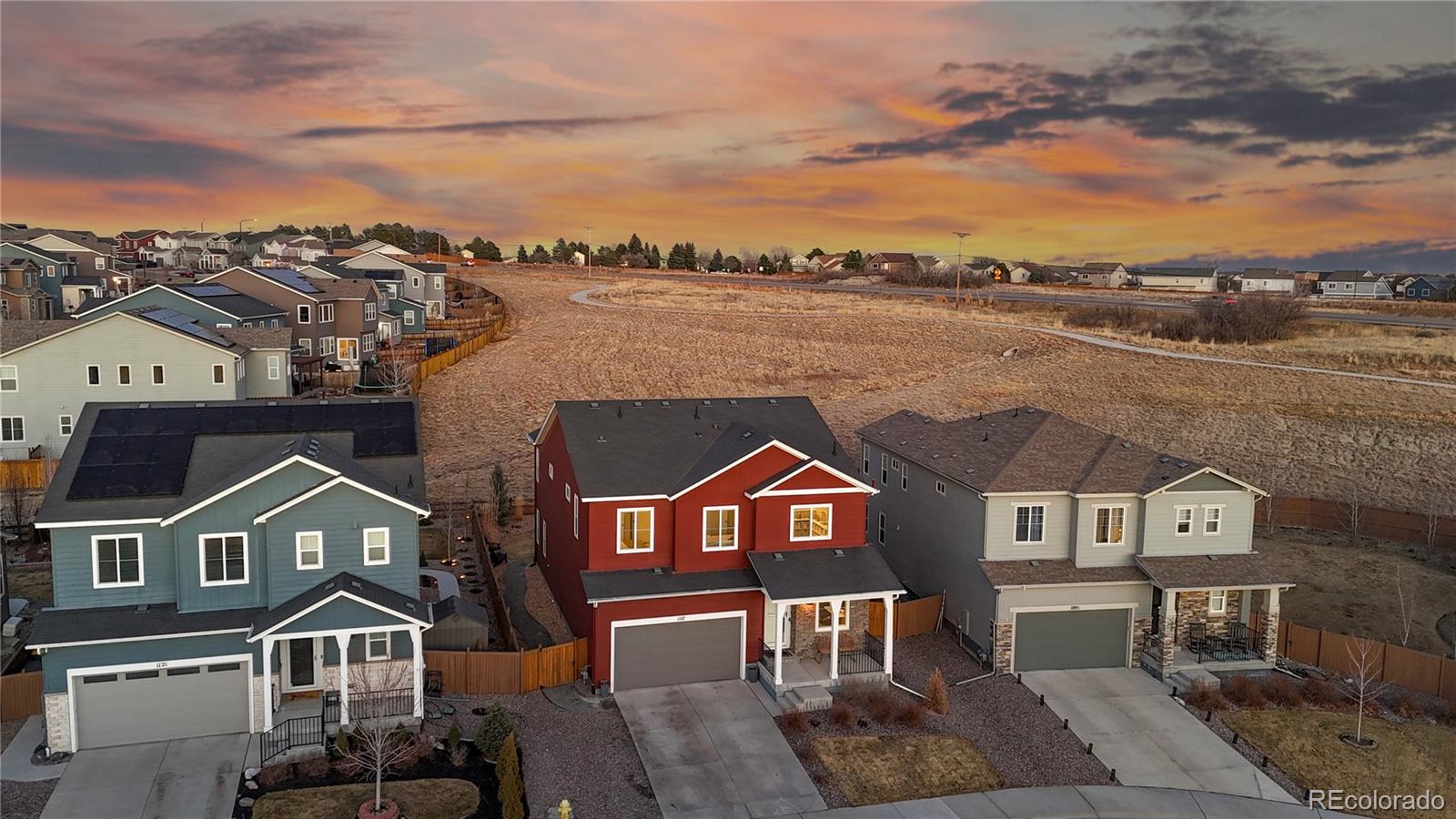 1107 Basalt Ridge Loop Castle Rock, CO 80108 - Photo 3 of 50 an aerial view of a house with a big yard