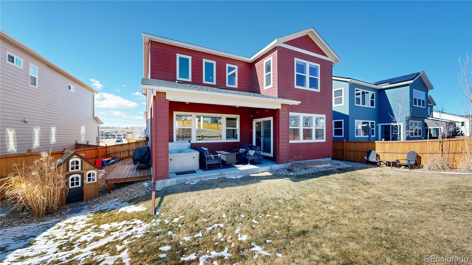 1107 Basalt Ridge Loop Castle Rock, CO 80108 - Photo 38 of 50 a view of a brick building with many windows