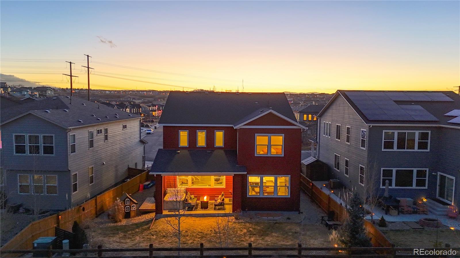 1107 Basalt Ridge Loop Castle Rock, CO 80108 - Photo 39 of 50 a front view of a house with a yard
