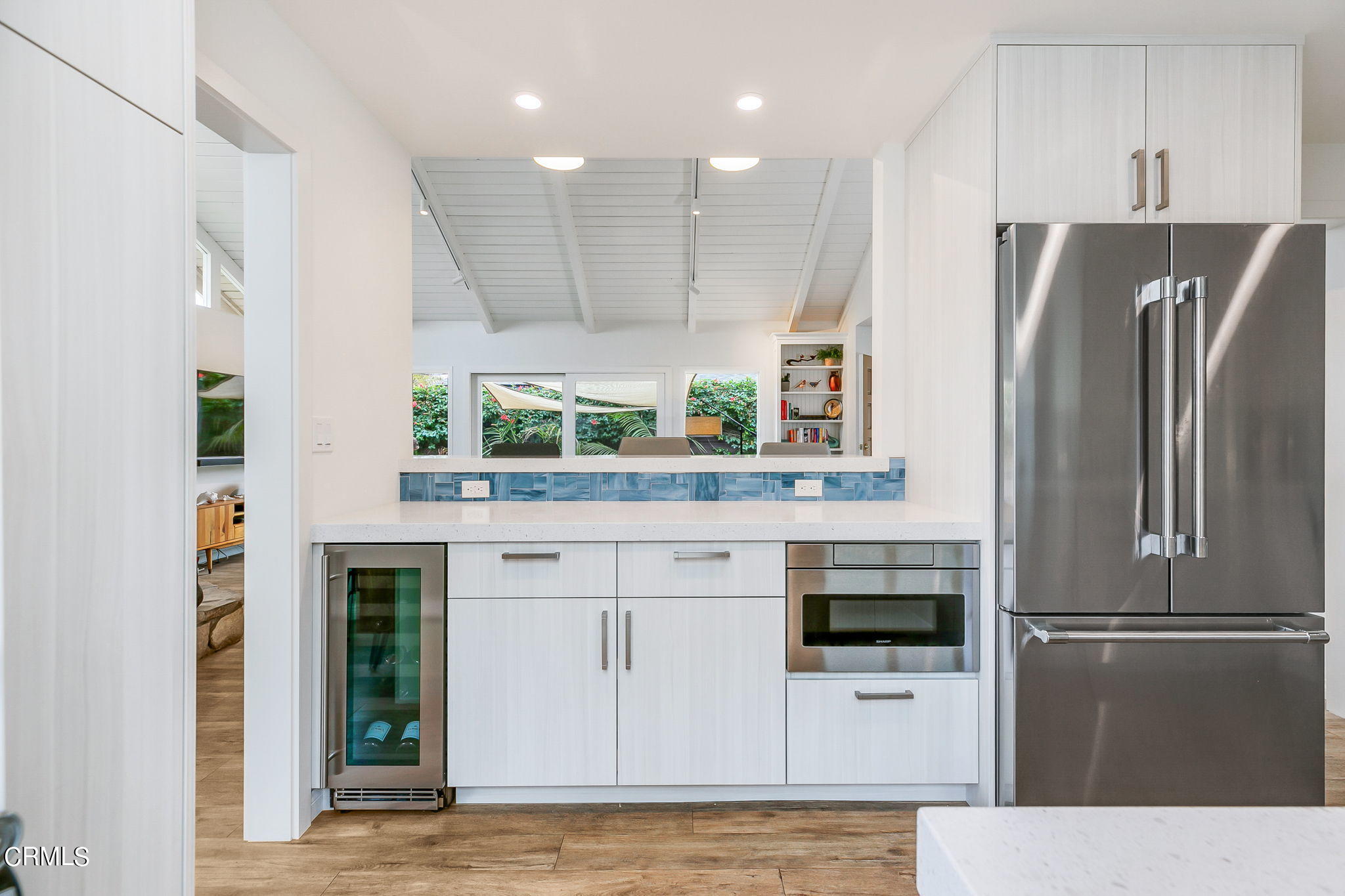 4930 Dolphin Way Oxnard, CA 93035 - Photo 16 of 44 a kitchen with stainless steel appliances a refrigerator sink and stove