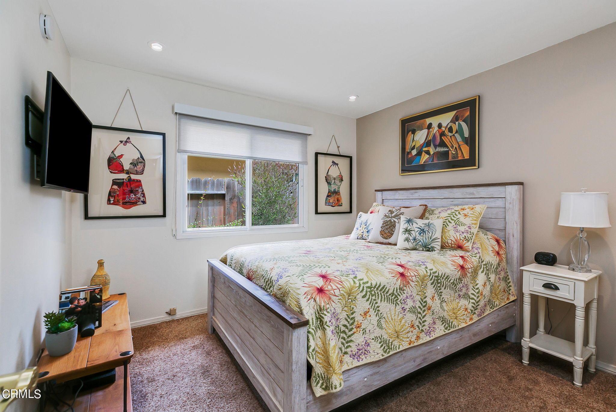 4930 Dolphin Way Oxnard, CA 93035 - Photo 17 of 44 a bedroom with a bed and a couch