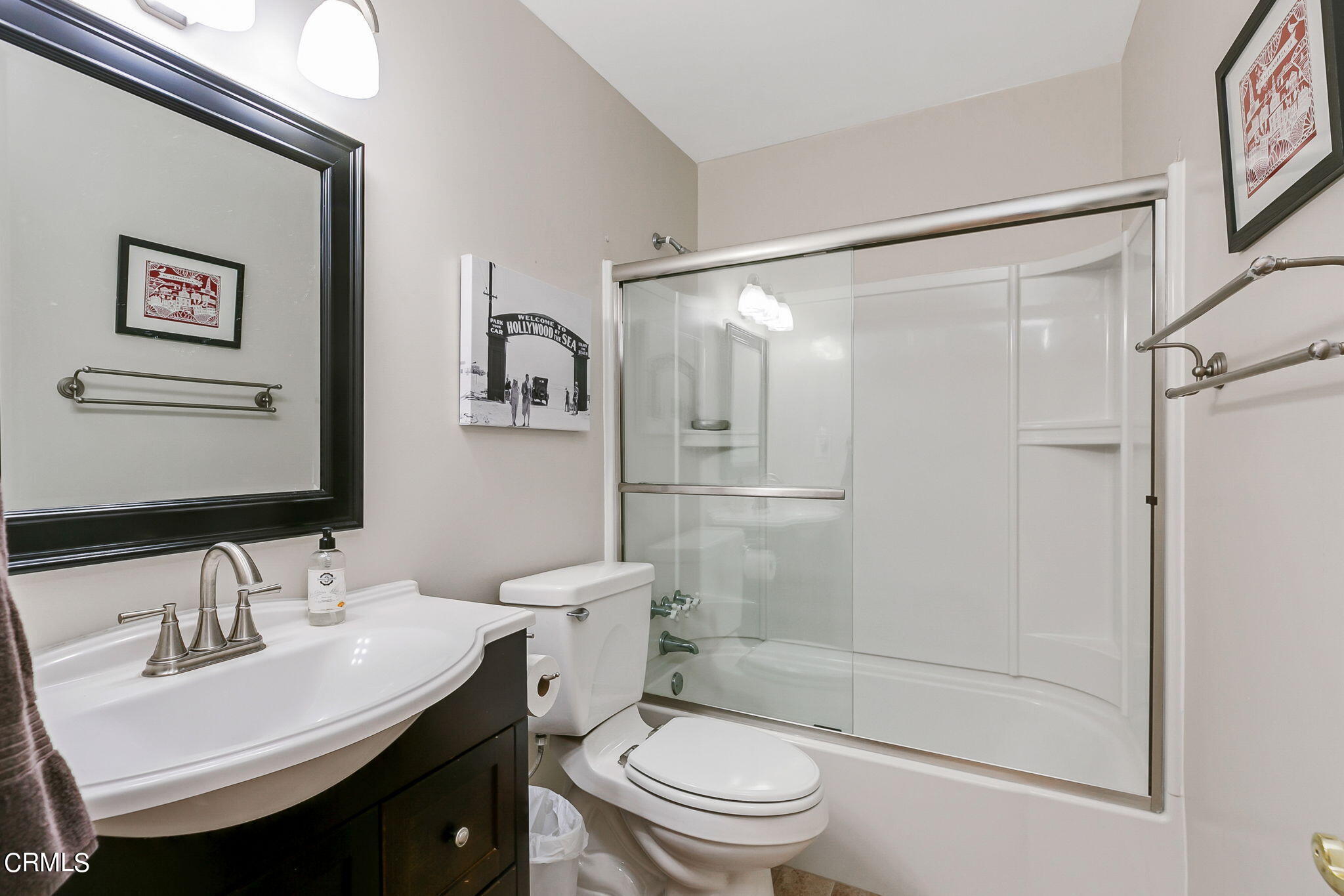 4930 Dolphin Way Oxnard, CA 93035 - Photo 19 of 44 a bathroom with a sink toilet and shower