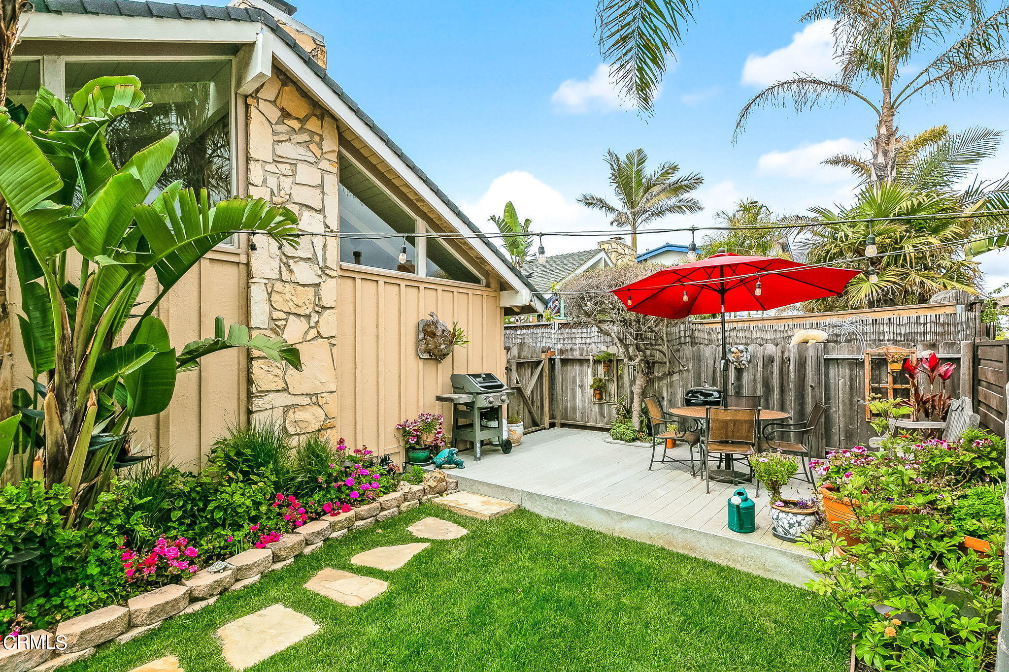 4930 Dolphin Way Oxnard, CA 93035 - Photo 29 of 44 a view of a house with a yard and sitting area