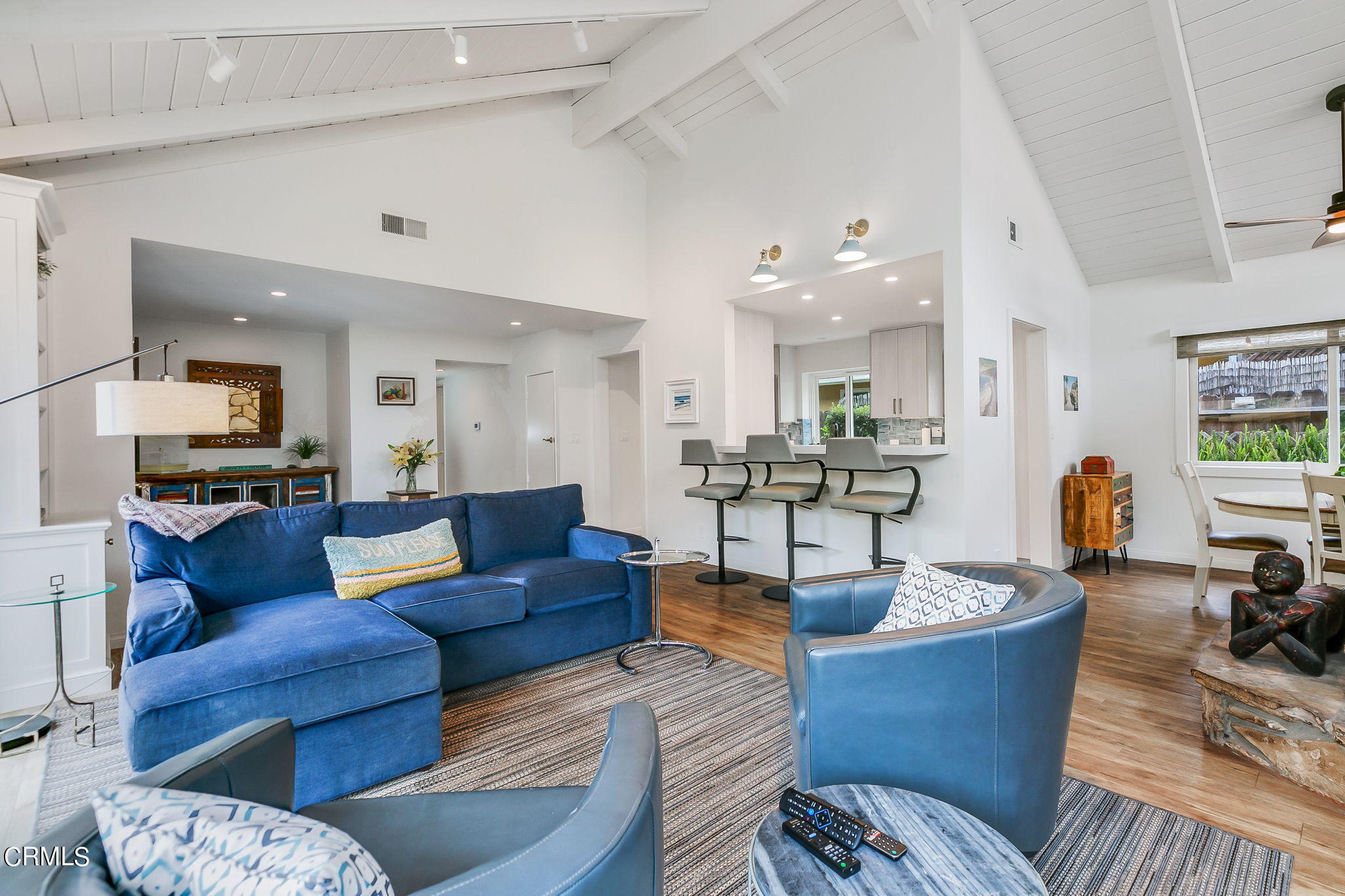 4930 Dolphin Way Oxnard, CA 93035 - Photo 4 of 44 a living room with furniture kitchen view and a table