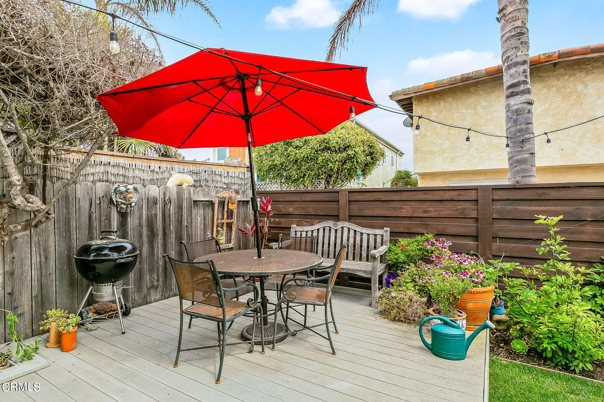 4930 Dolphin Way Oxnard, CA 93035 - Photo 33 of 44 a view of a chair and table on the wooden floor