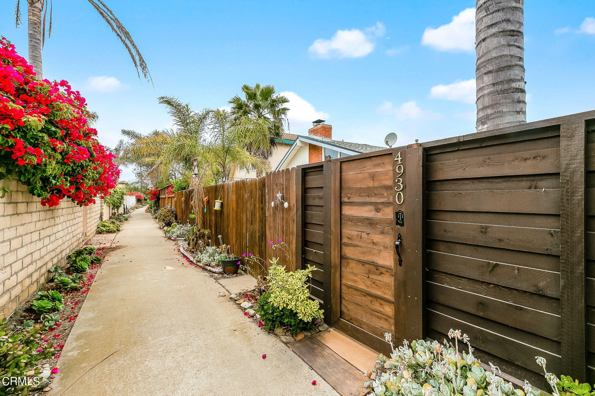 4930 Dolphin Way Oxnard, CA 93035 - Photo 34 of 44 a view of path along with potted plants