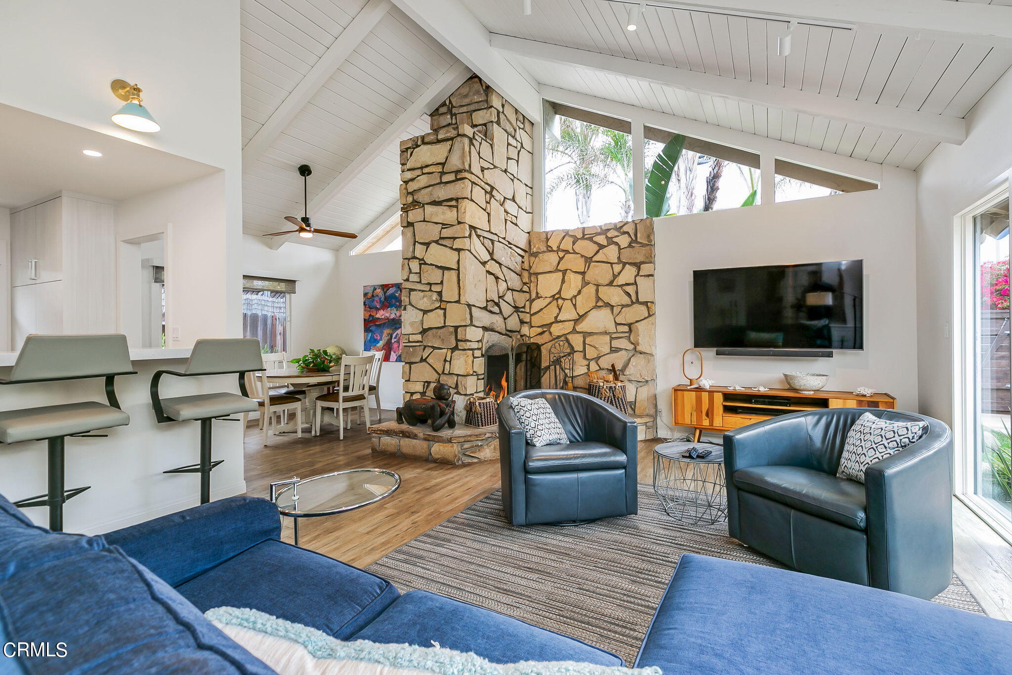 4930 Dolphin Way Oxnard, CA 93035 - Photo 10 of 44 a living room with fireplace furniture and a flat screen tv