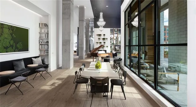 a view of a living room and dining room