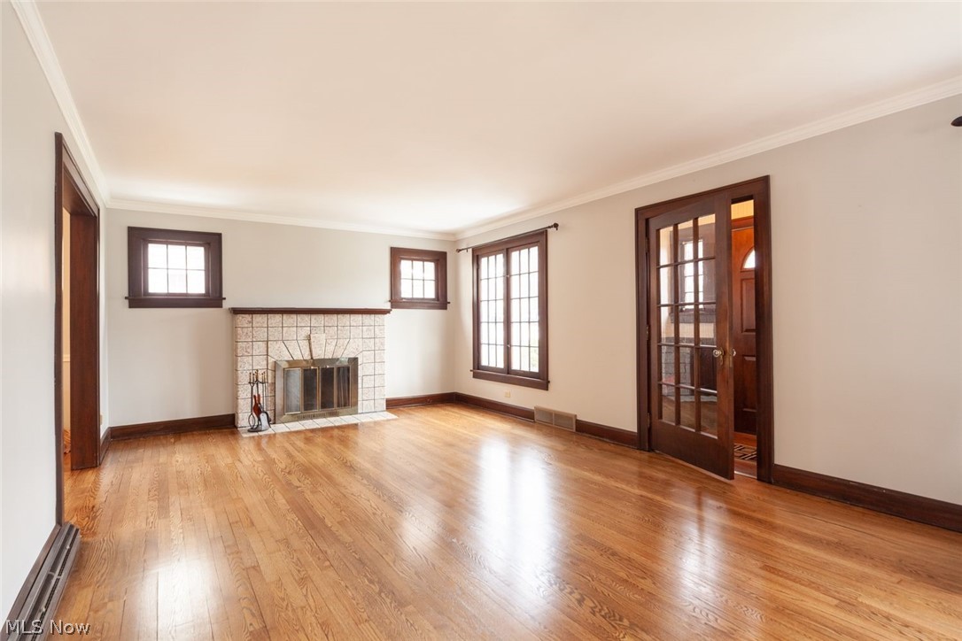 2056 Cleveland Road Wooster, OH 44691 - Photo 5 of 35 Spacious living room...all first floors red oak hardwood floors were finished in 2021!