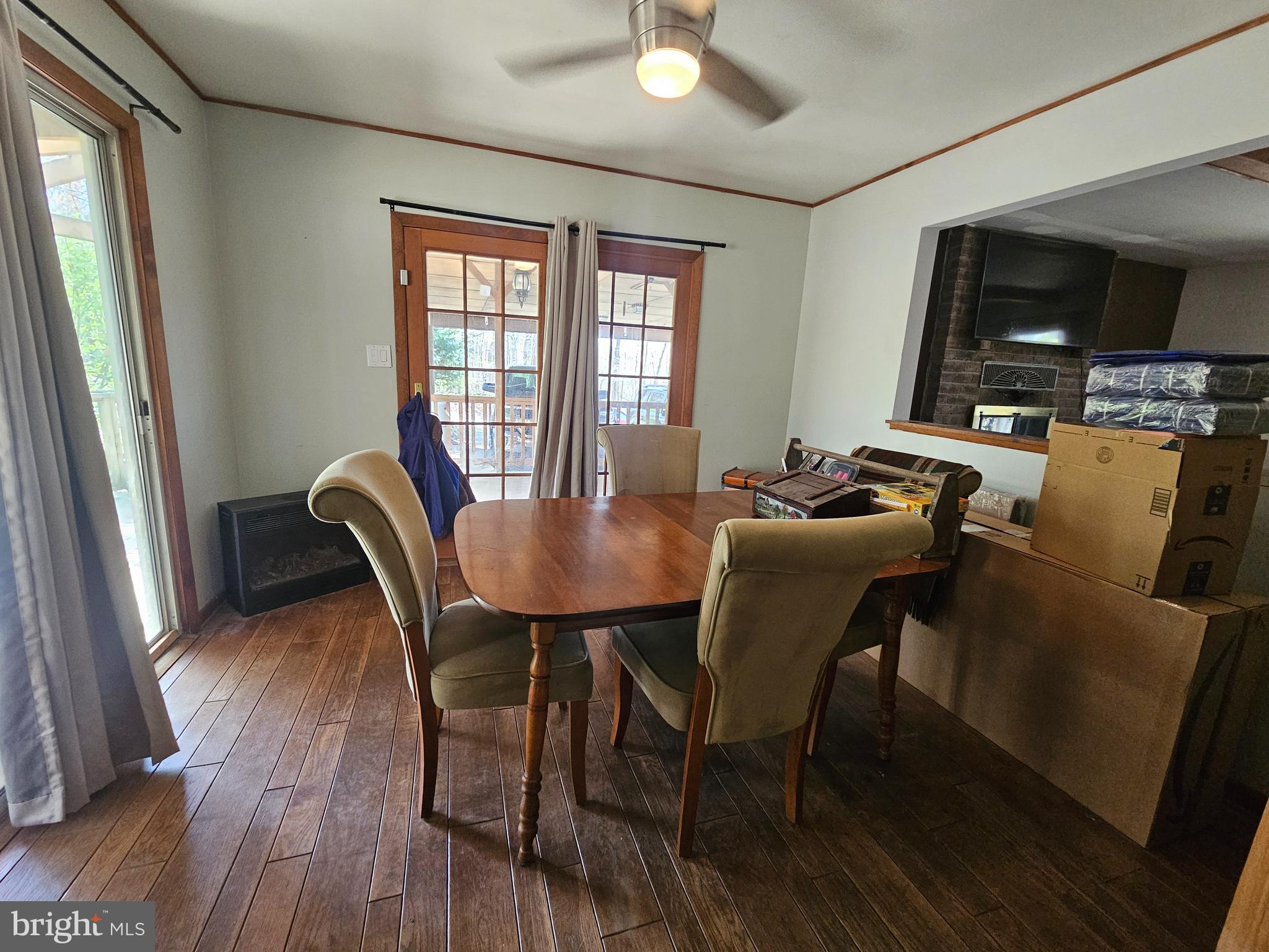 2733 Bachman Road Westminster, MD 21157 - Photo 11 of 43 a view of a dining room with furniture window and wooden floor