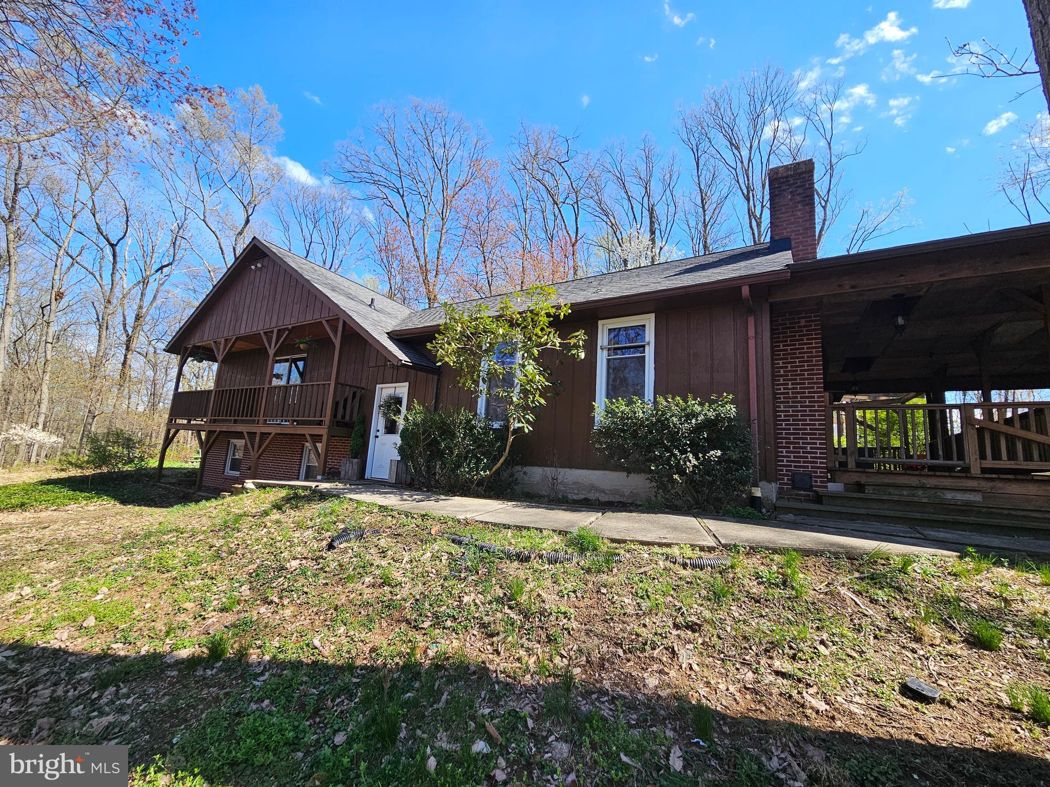 2733 Bachman Road Westminster, MD 21157 - Photo 2 of 43 a front view of a house with garden
