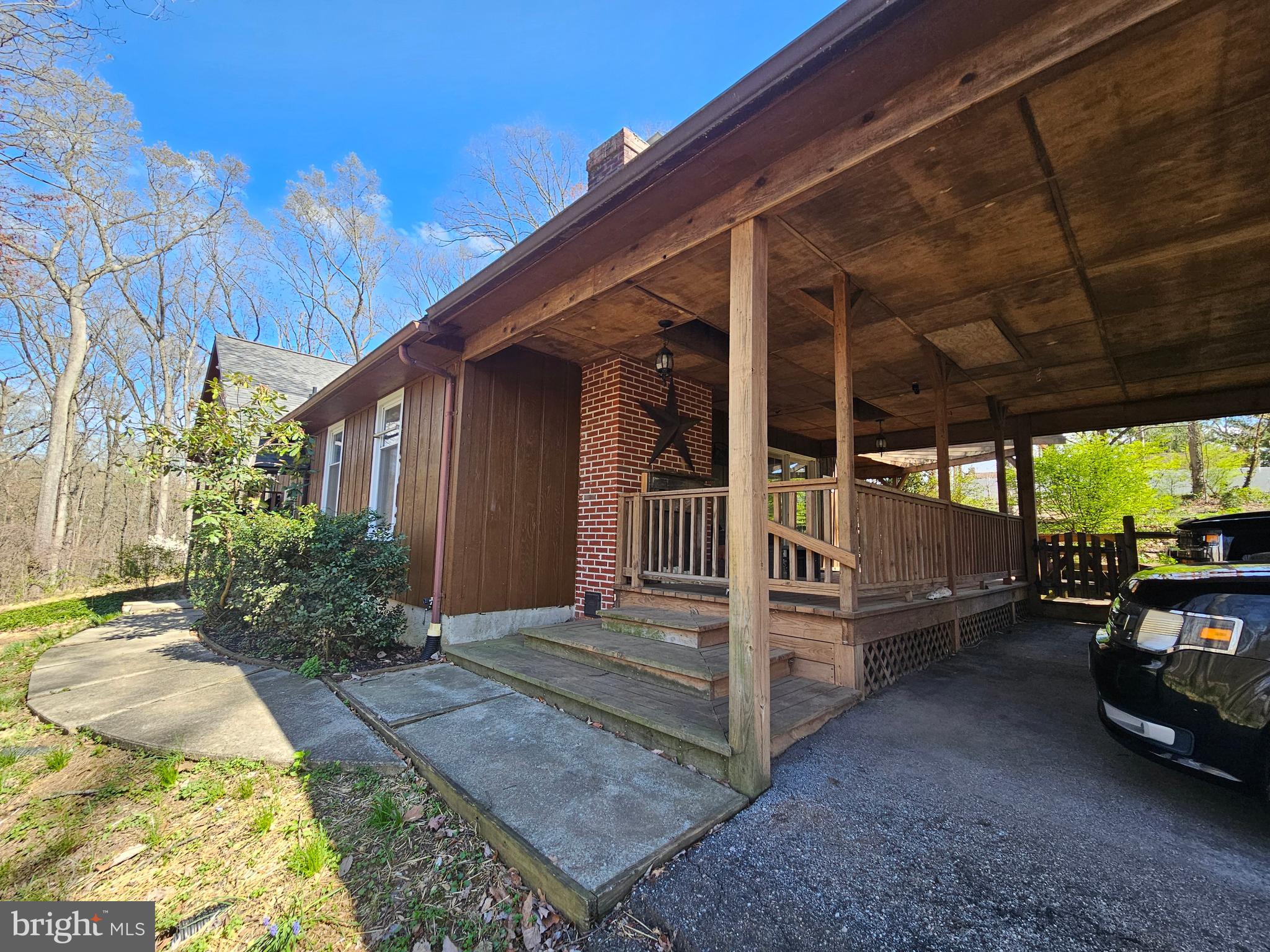 2733 Bachman Road Westminster, MD 21157 - Photo 3 of 43 a view of a porch with furniture and a yard